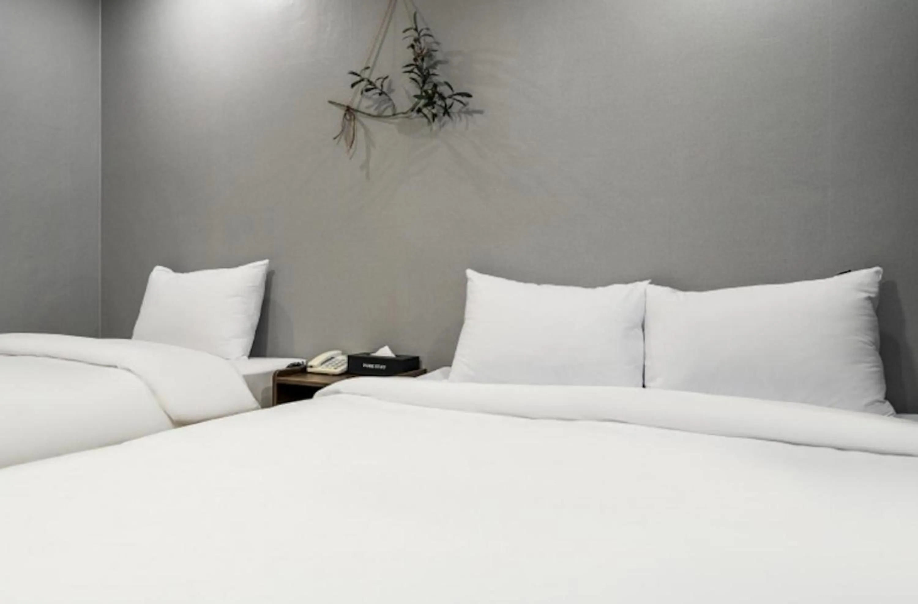 Bed in Jeju Pure Stay Ocean