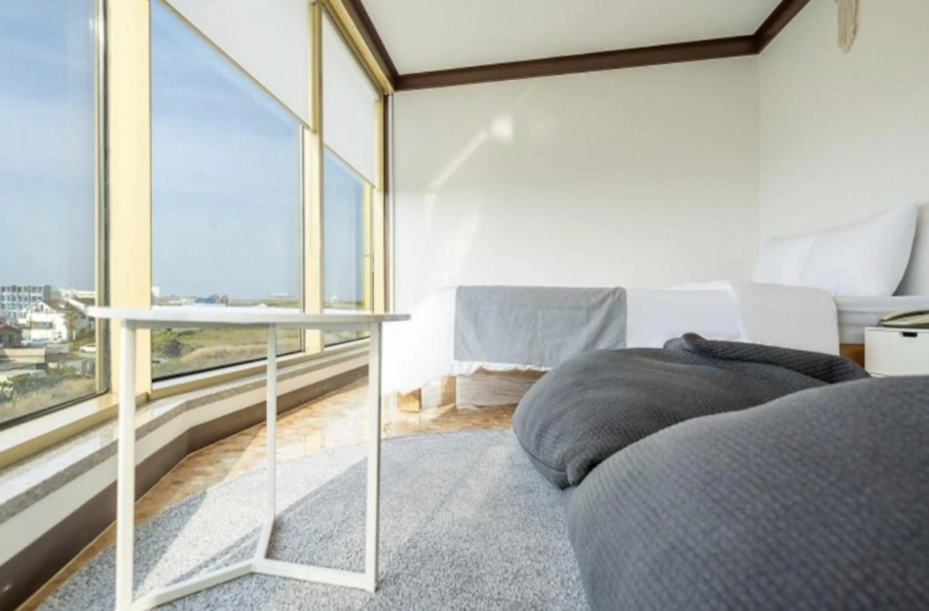 Bed in Jeju Pure Stay Ocean