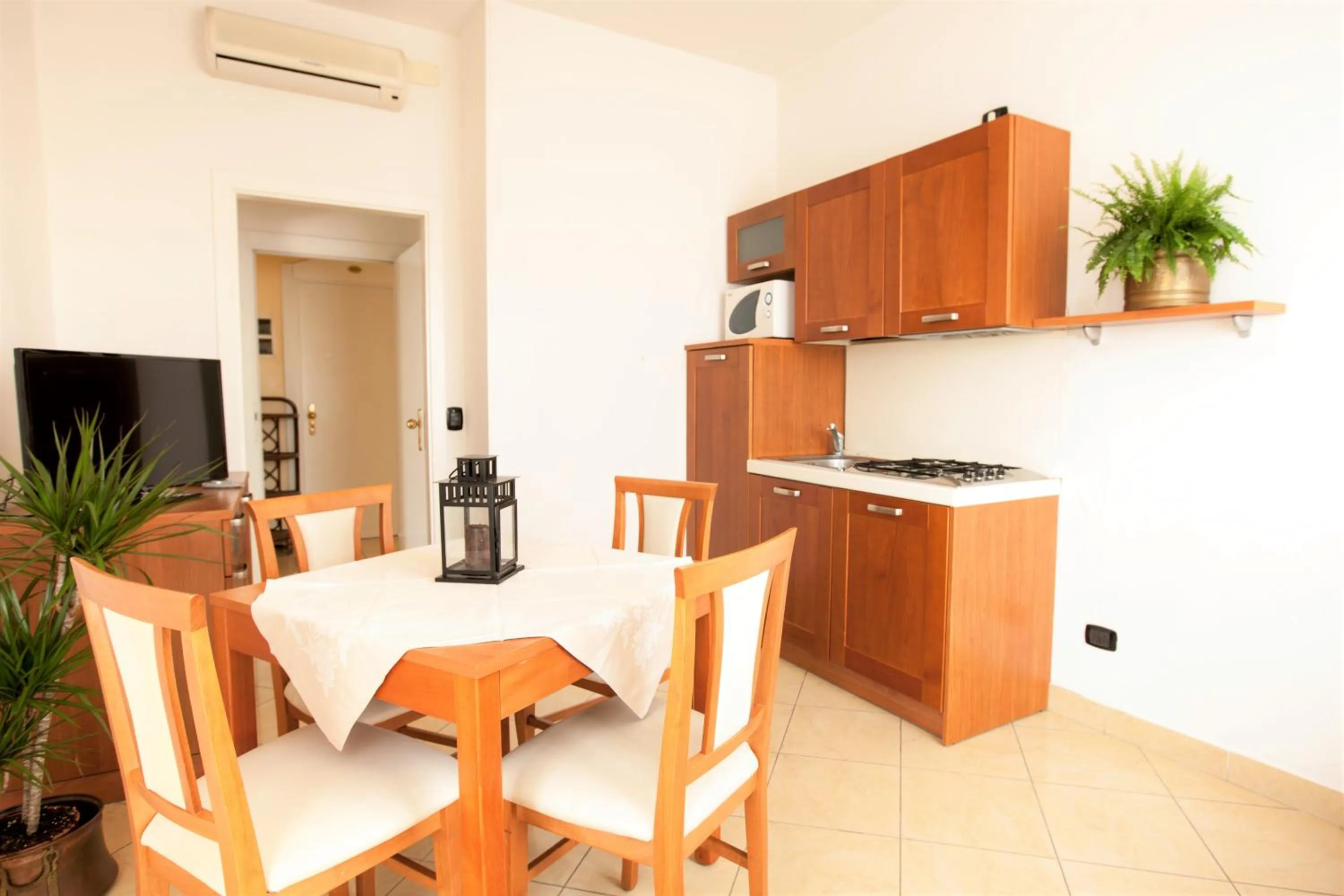 Kitchen or kitchenette in Residence Fellini