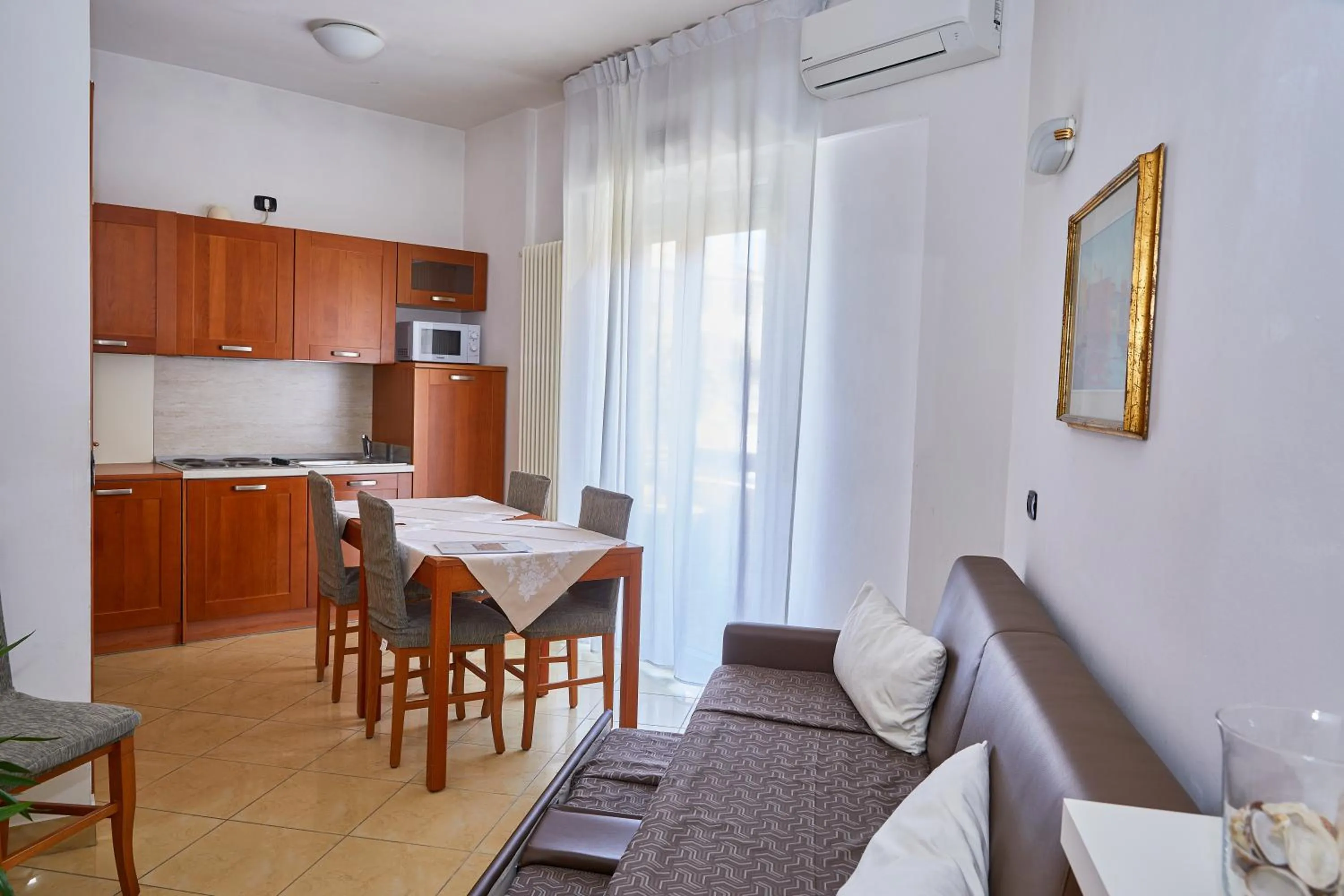 Kitchen or kitchenette in Residence Fellini