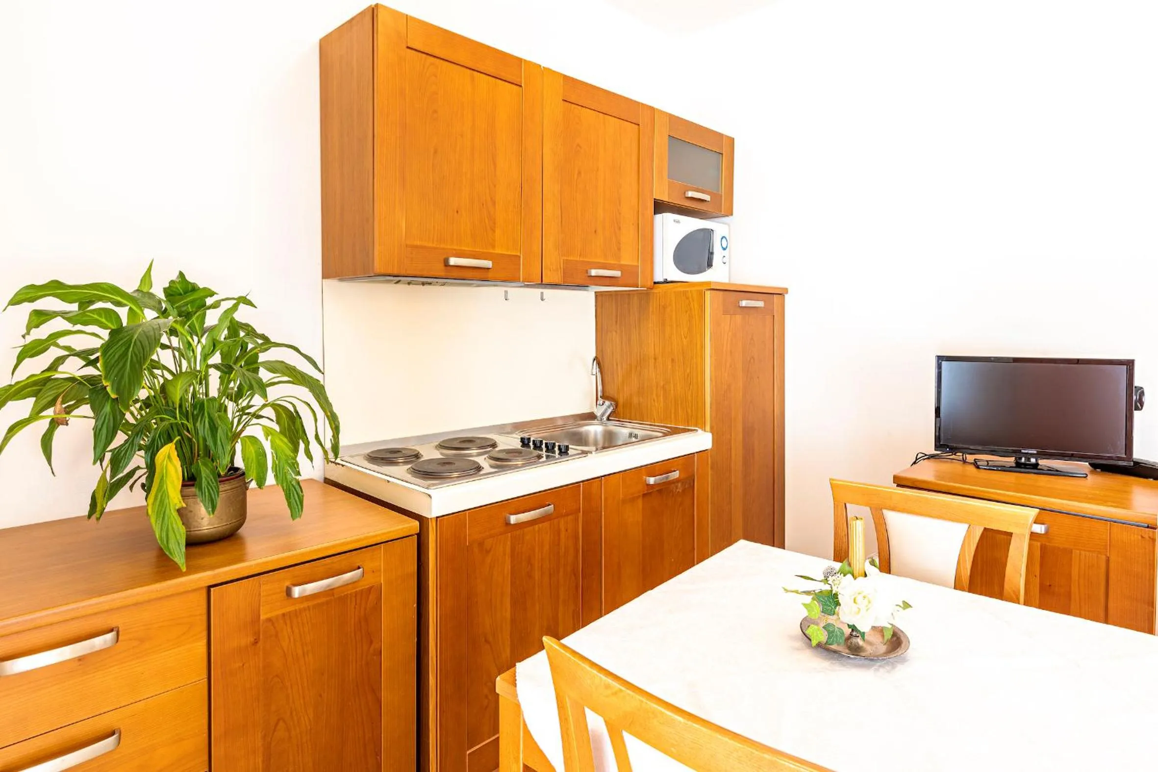 Kitchen or kitchenette in Residence Fellini