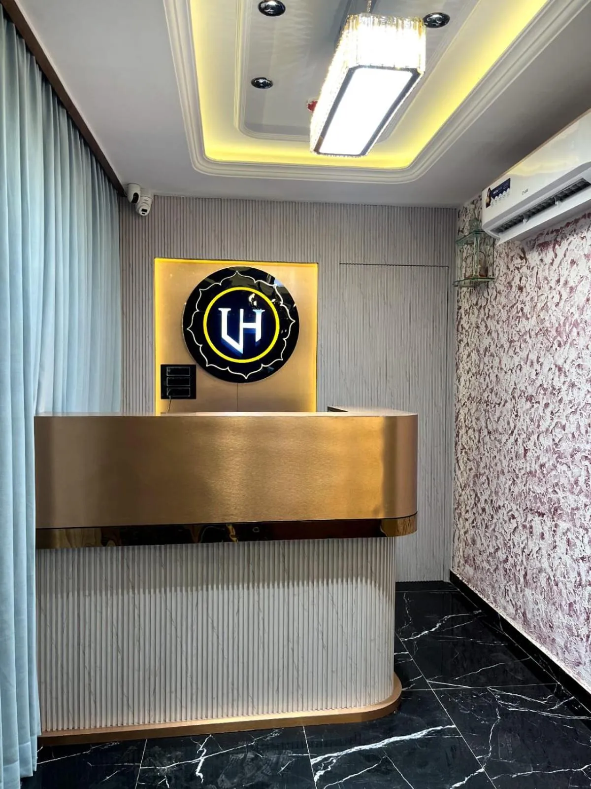 Property logo or sign in Hotel Luxurious Inn