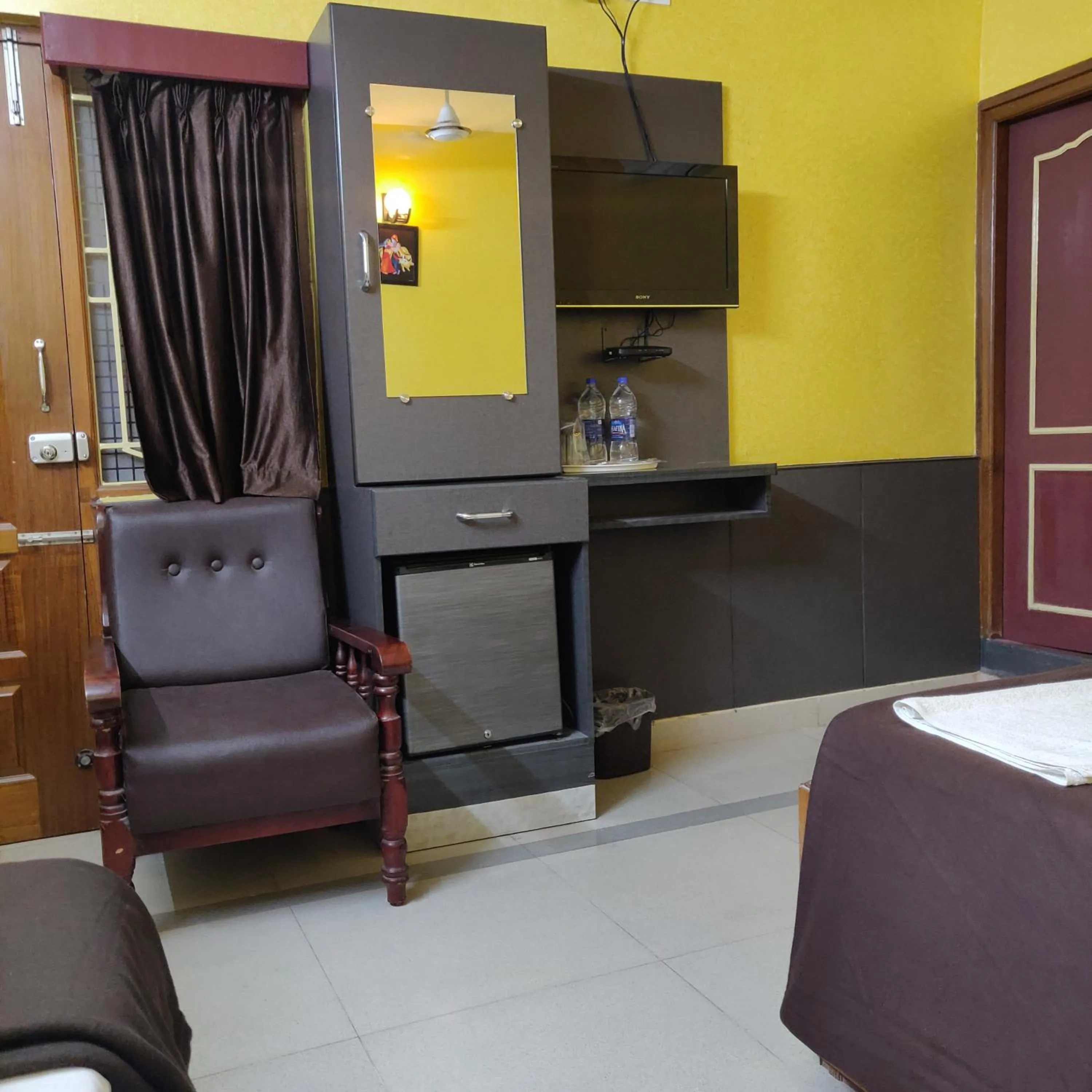 Bedroom in Arudhra Residency