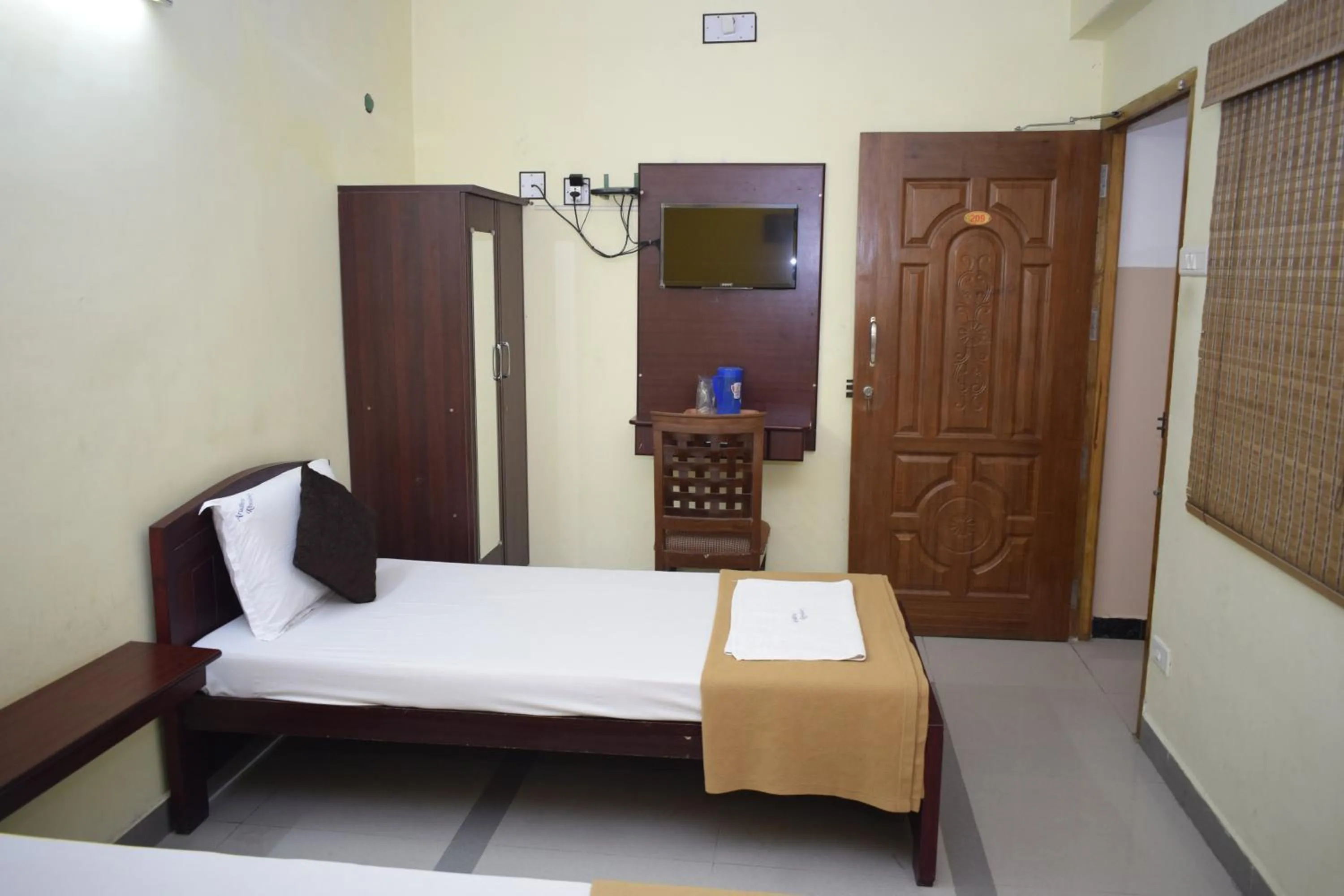 Bed in Arudhra Residency