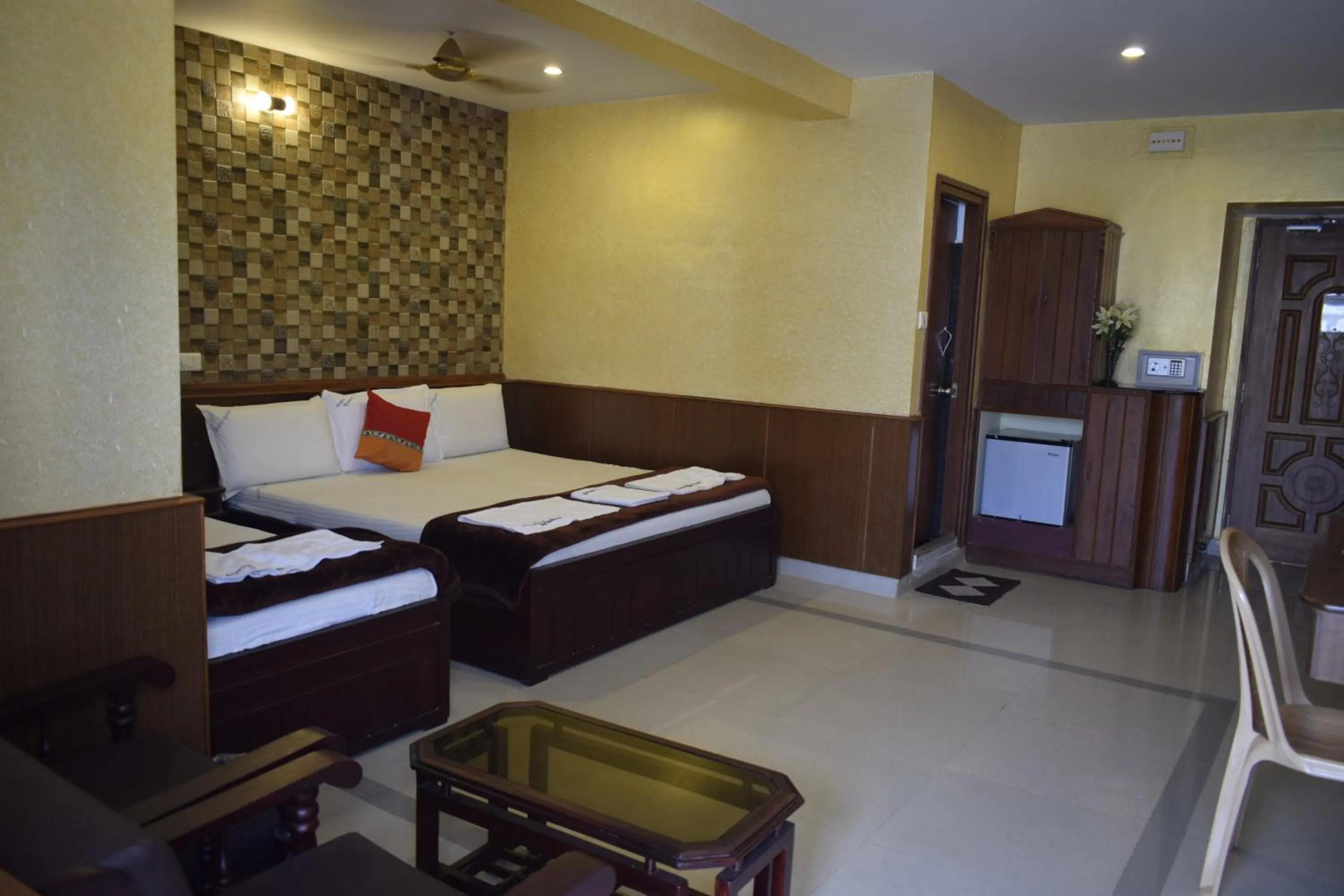 Photo of the whole room, Bed in Arudhra Residency