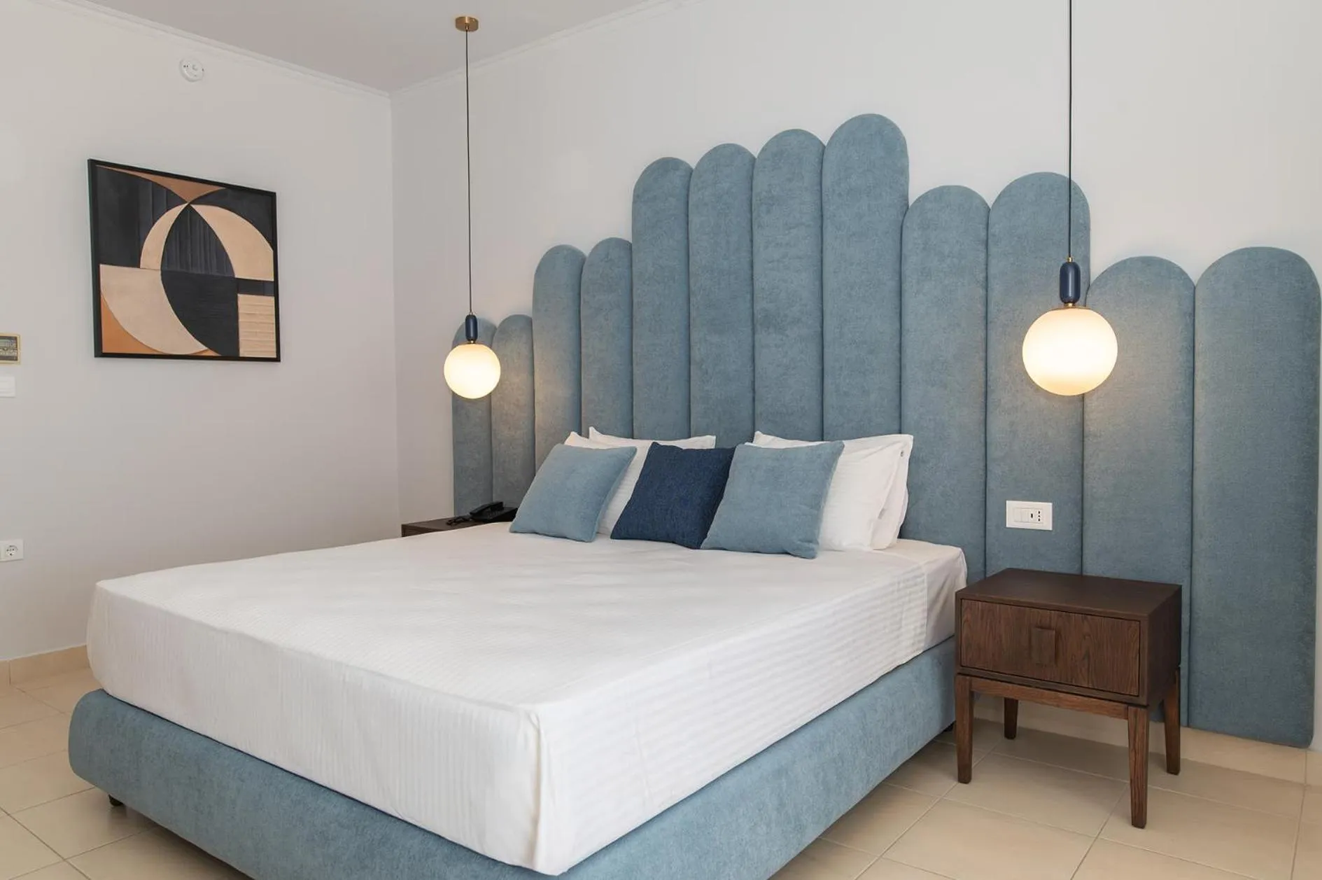 Bed in Grand Blue Beach Hotel