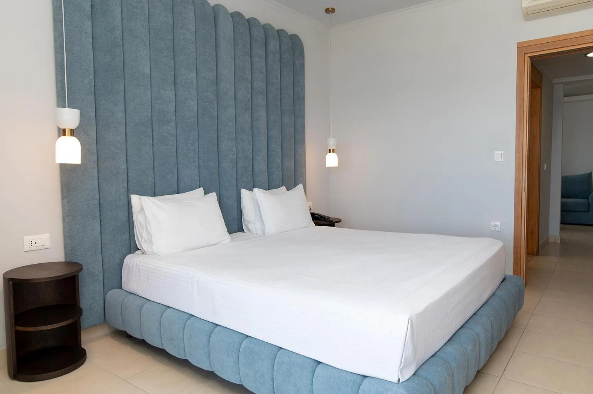 Bed in Grand Blue Beach Hotel