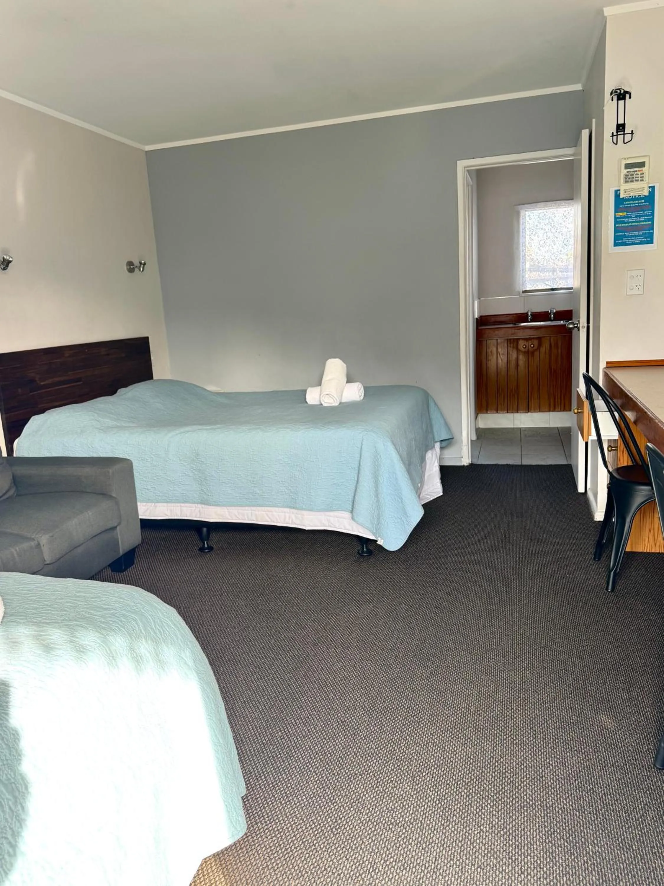 Bed in Papakura Pioneer Motor Lodge & Motel