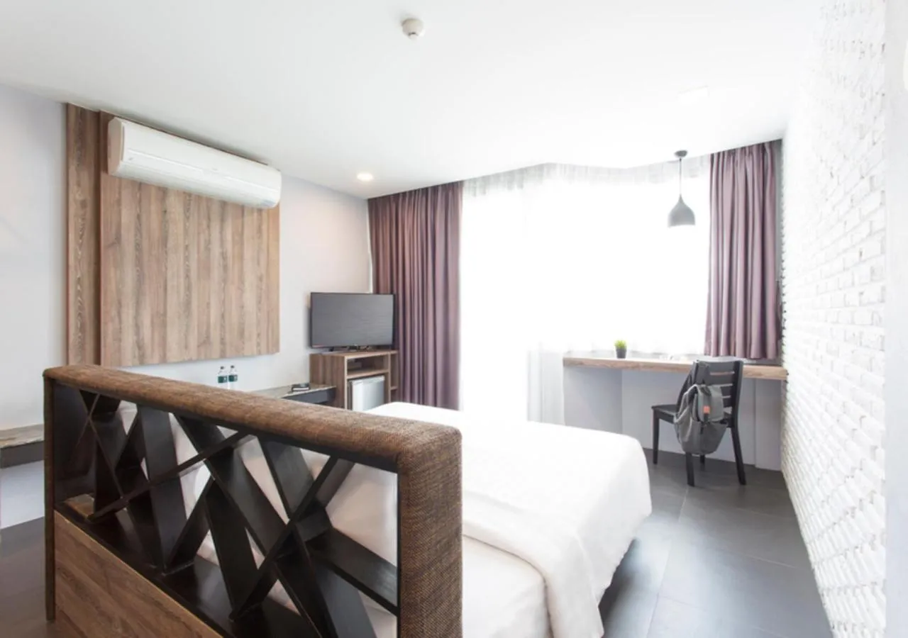 Bed in Cross Vibe Chiang Mai Decem Nimman Hotel