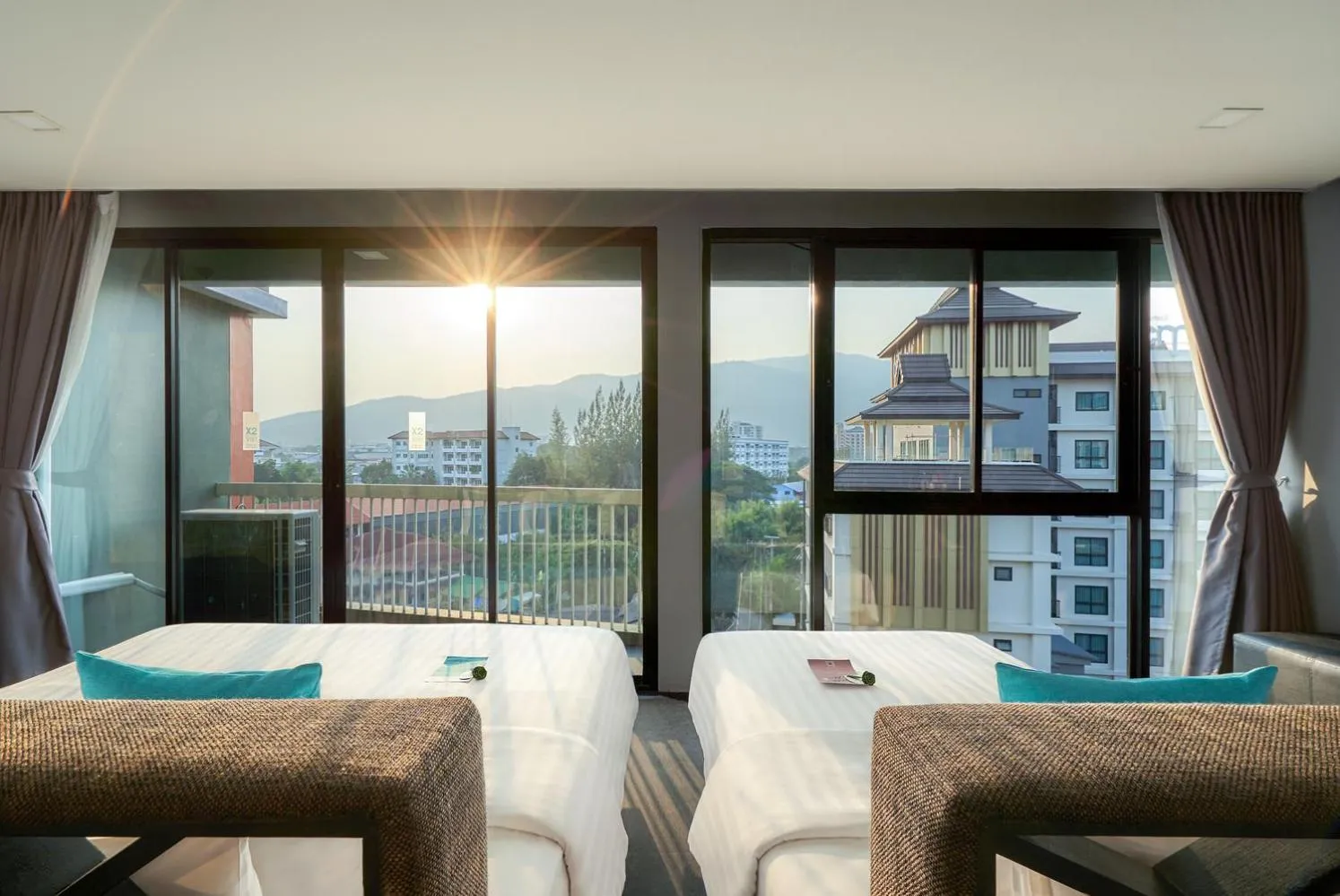 Bed in Cross Vibe Chiang Mai Decem Nimman Hotel