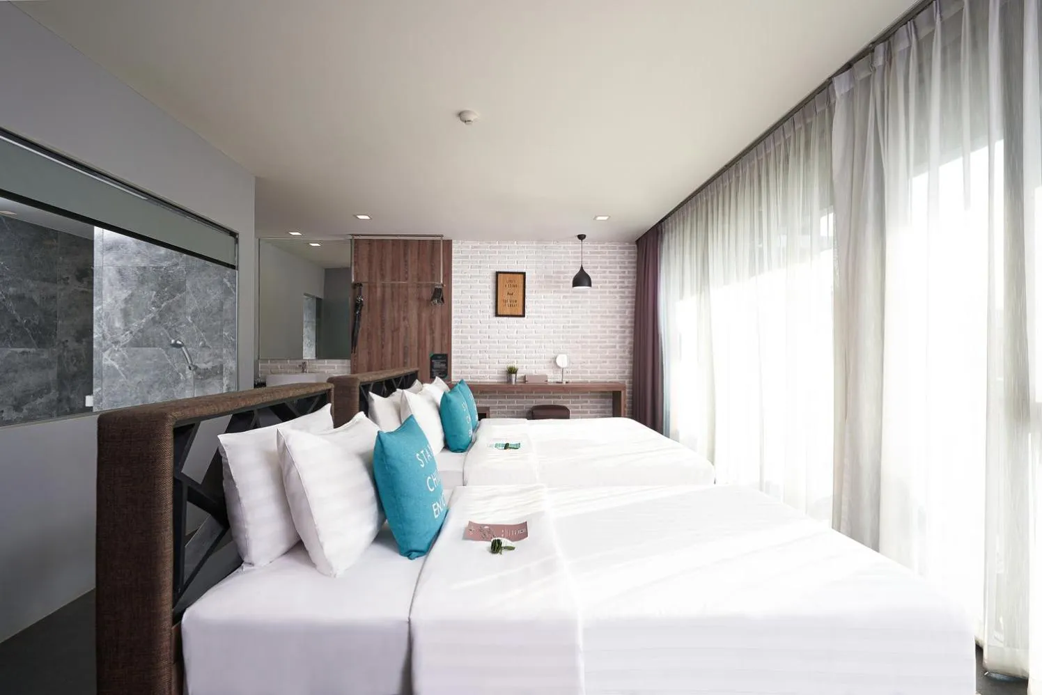 Bed in Cross Vibe Chiang Mai Decem Nimman Hotel