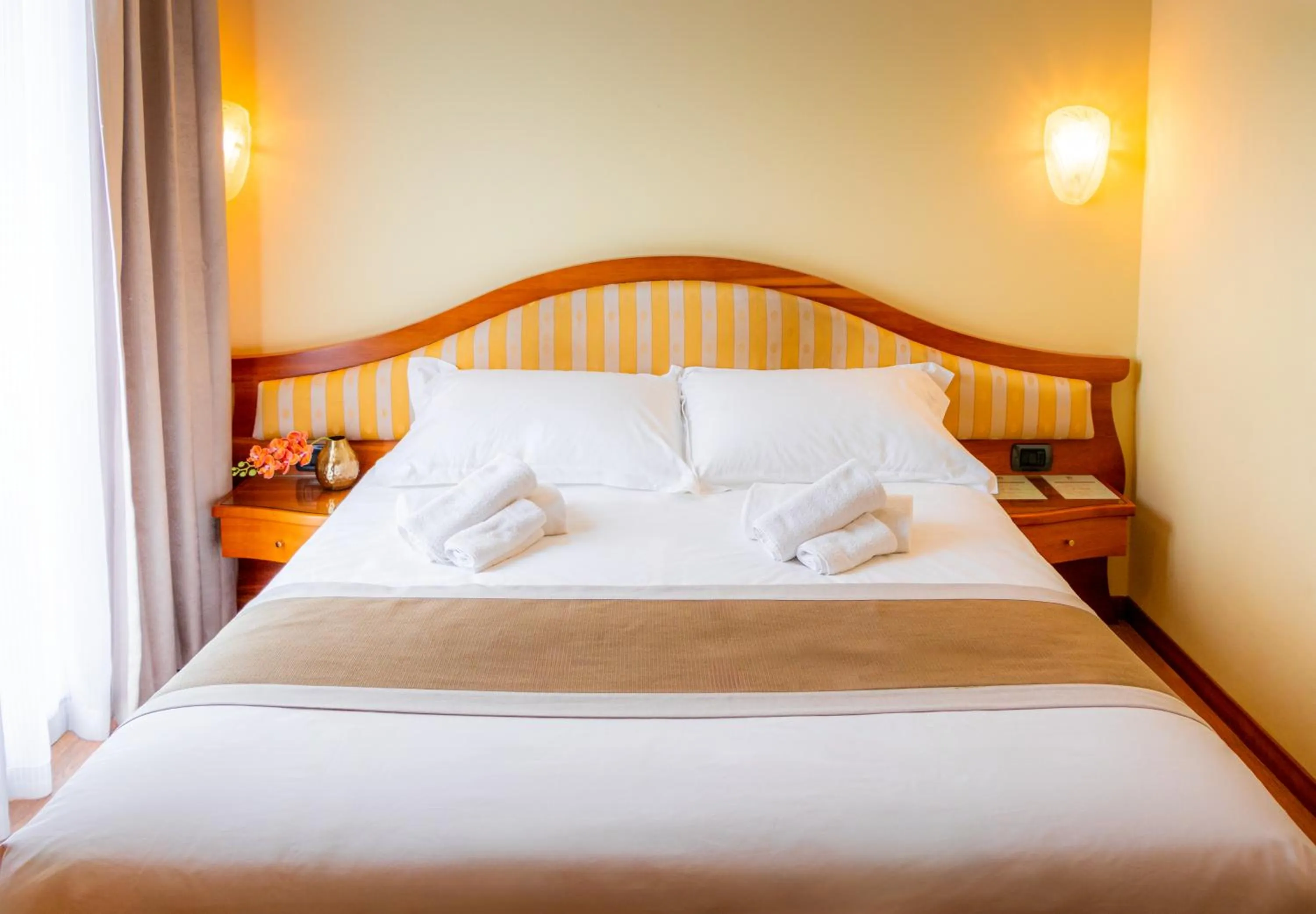 Bed in Hotel San Clemente