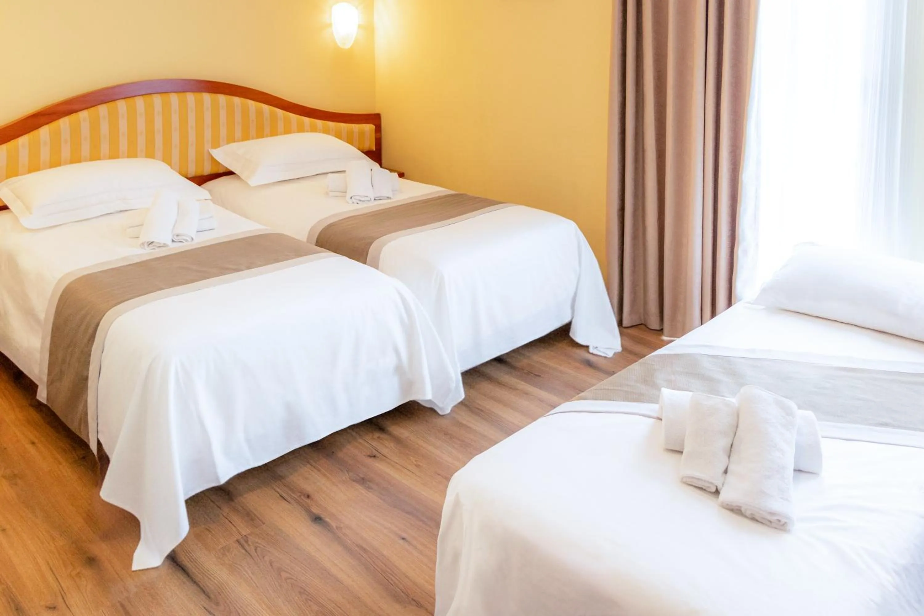 Bed in Hotel San Clemente