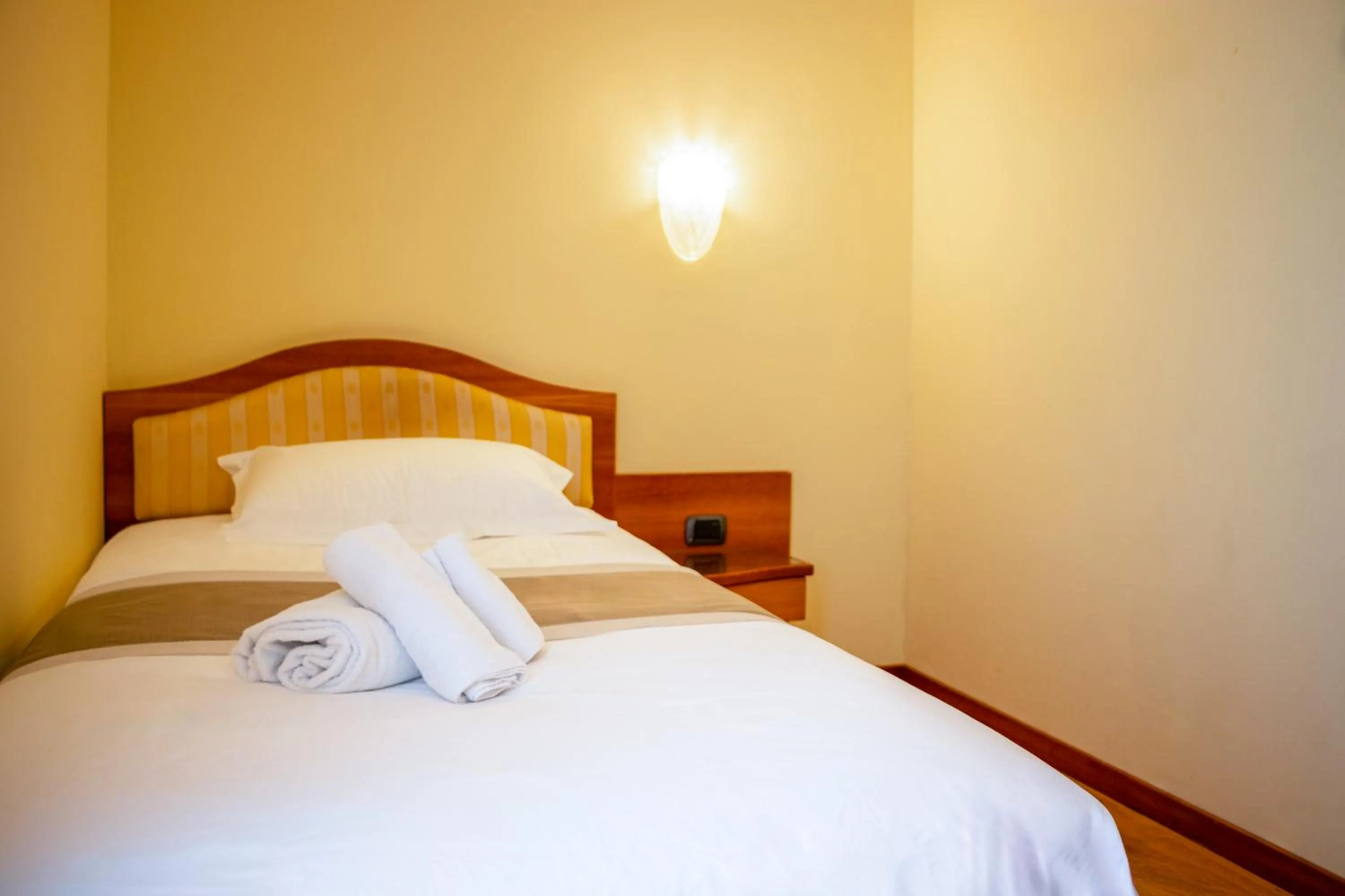 Bed in Hotel San Clemente