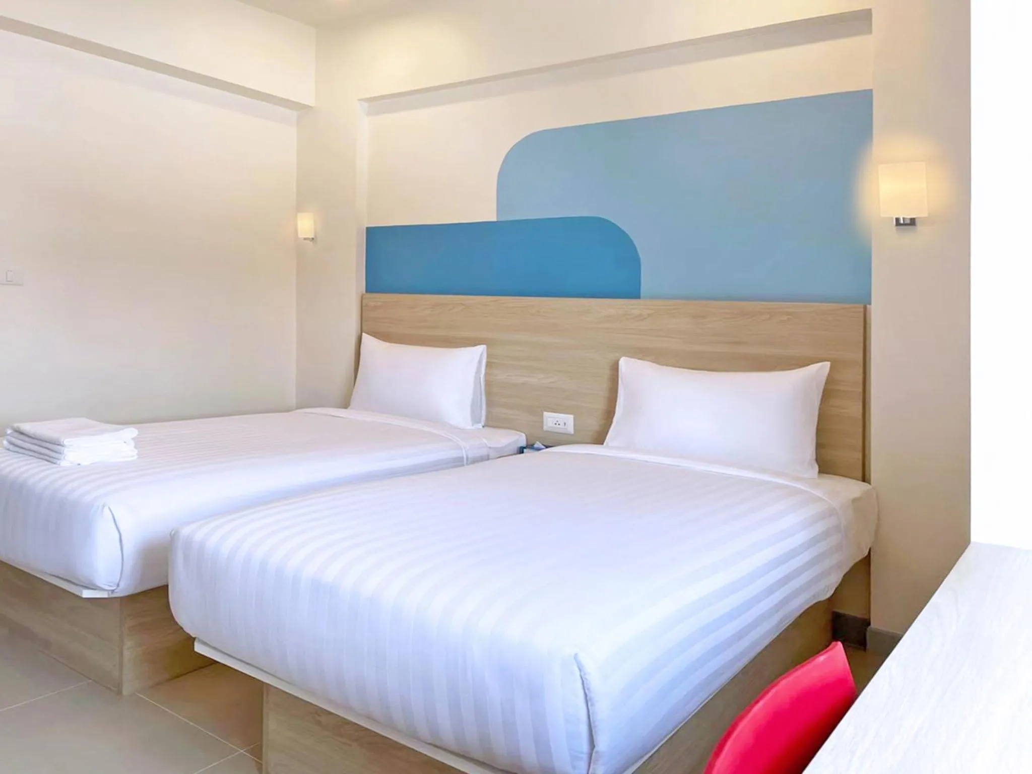 Bed in HOP INN Nakhon Si Thammarat