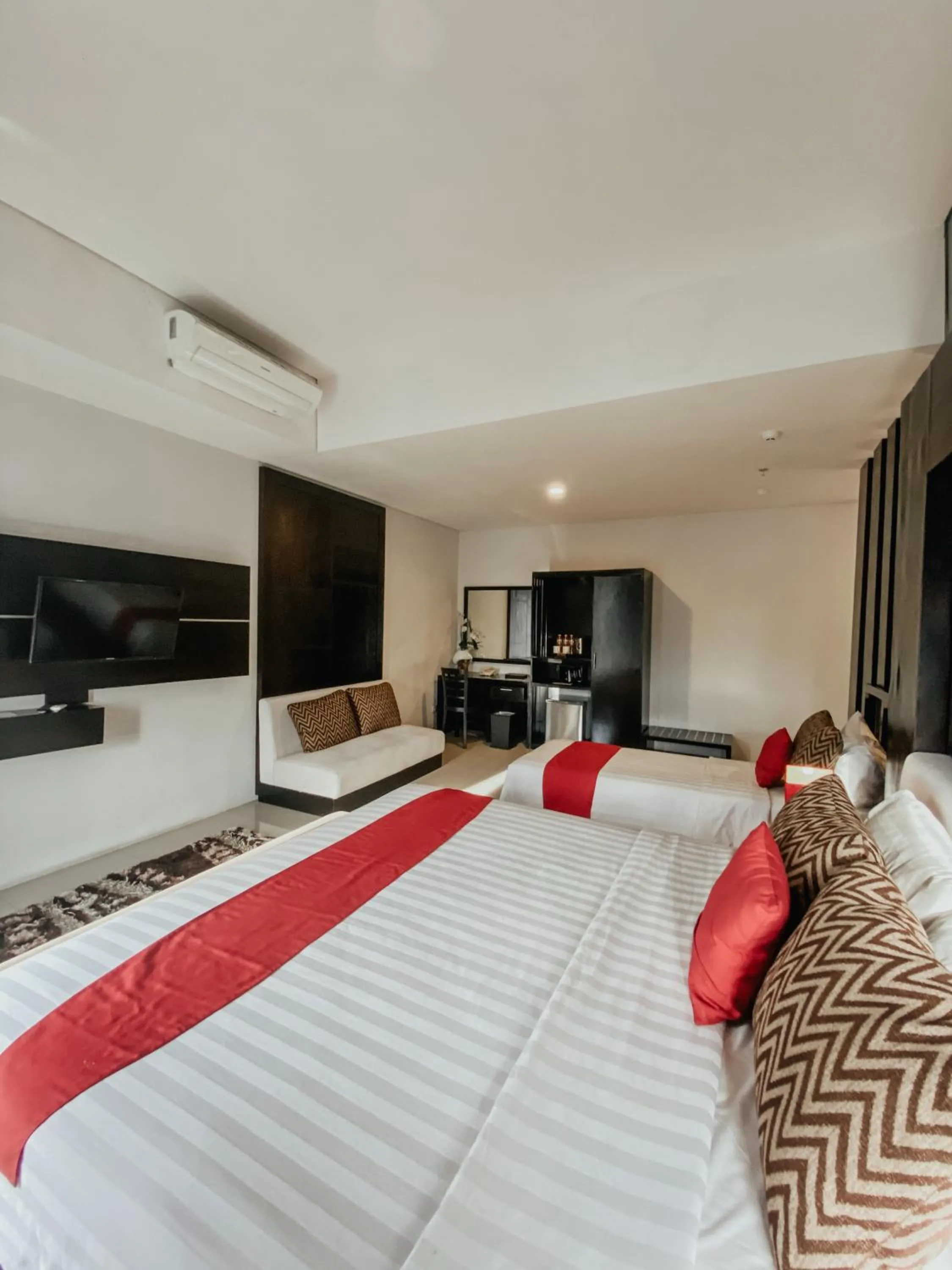 Bed in Prima SR Hotel & Convention Yogyakarta