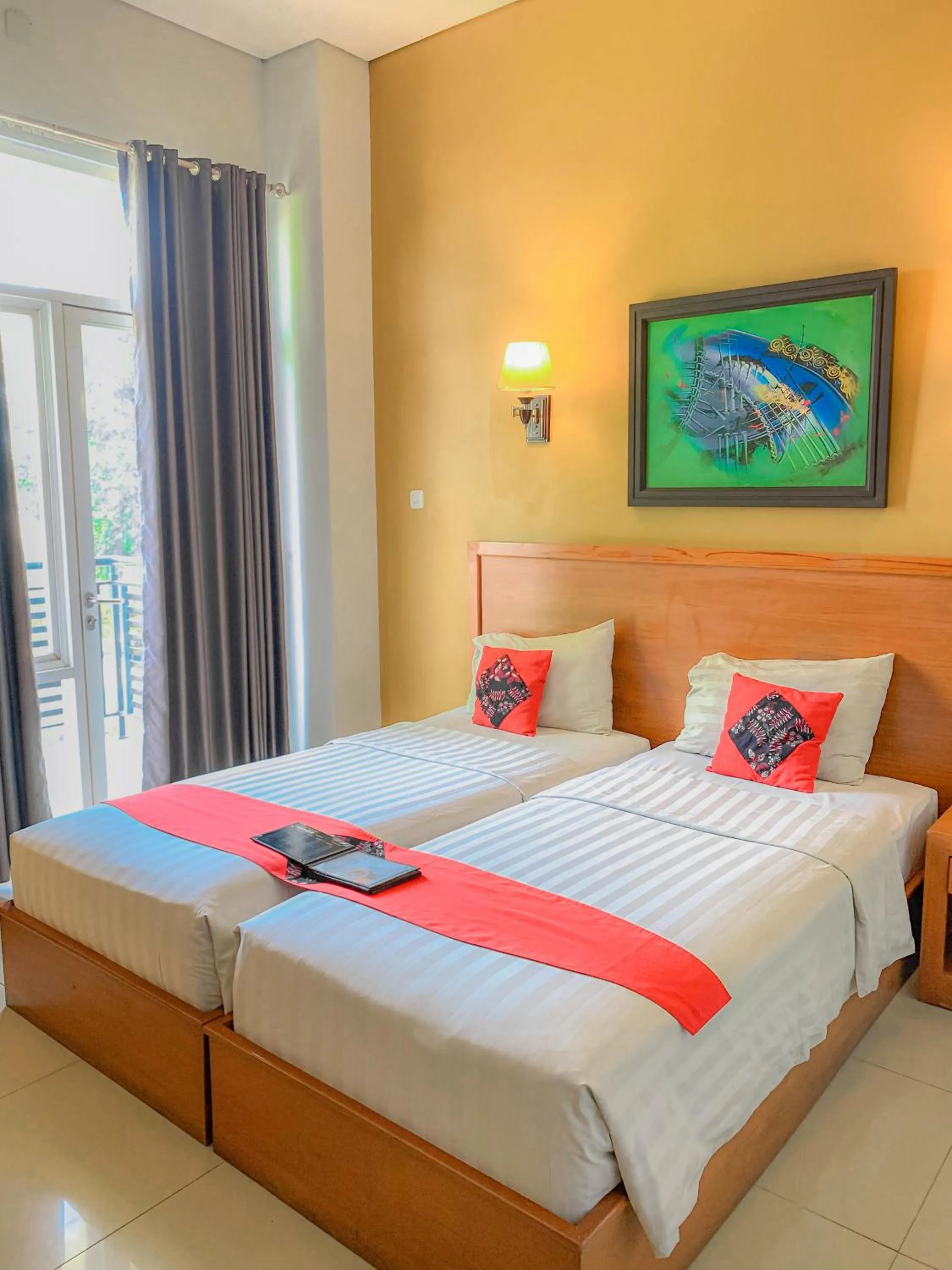 Property building, Bed in Prima SR Hotel & Convention Yogyakarta