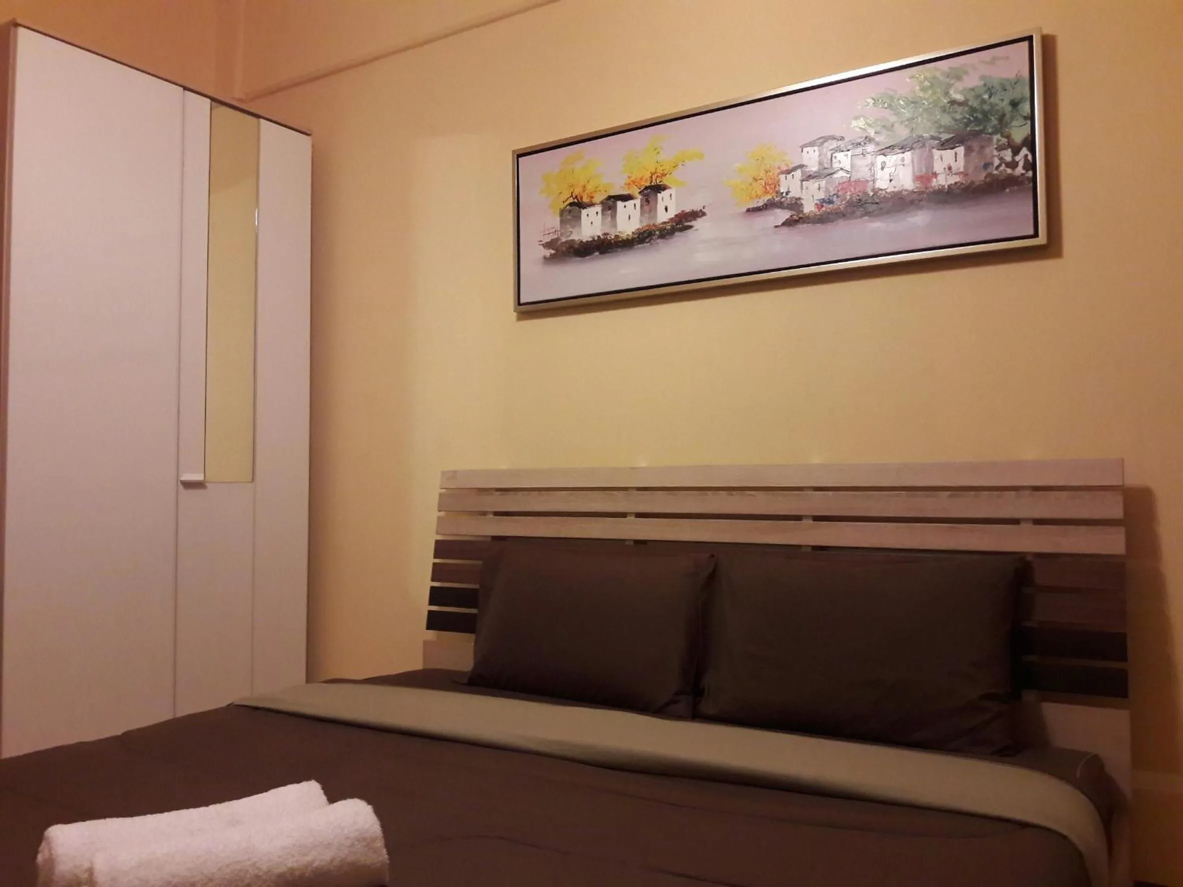 Bed in Navavilla Serviced Apartment