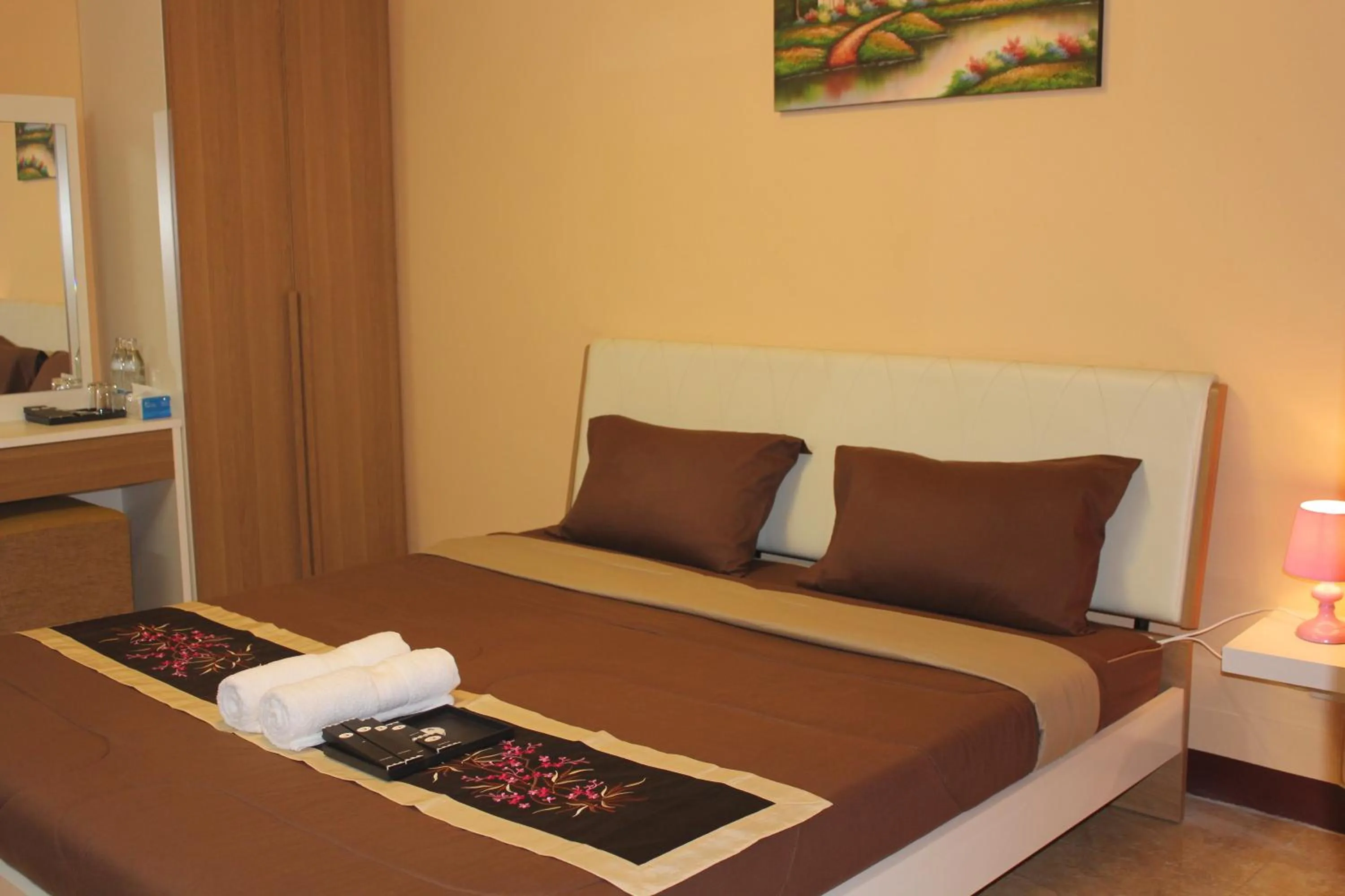 Bed in Navavilla Serviced Apartment