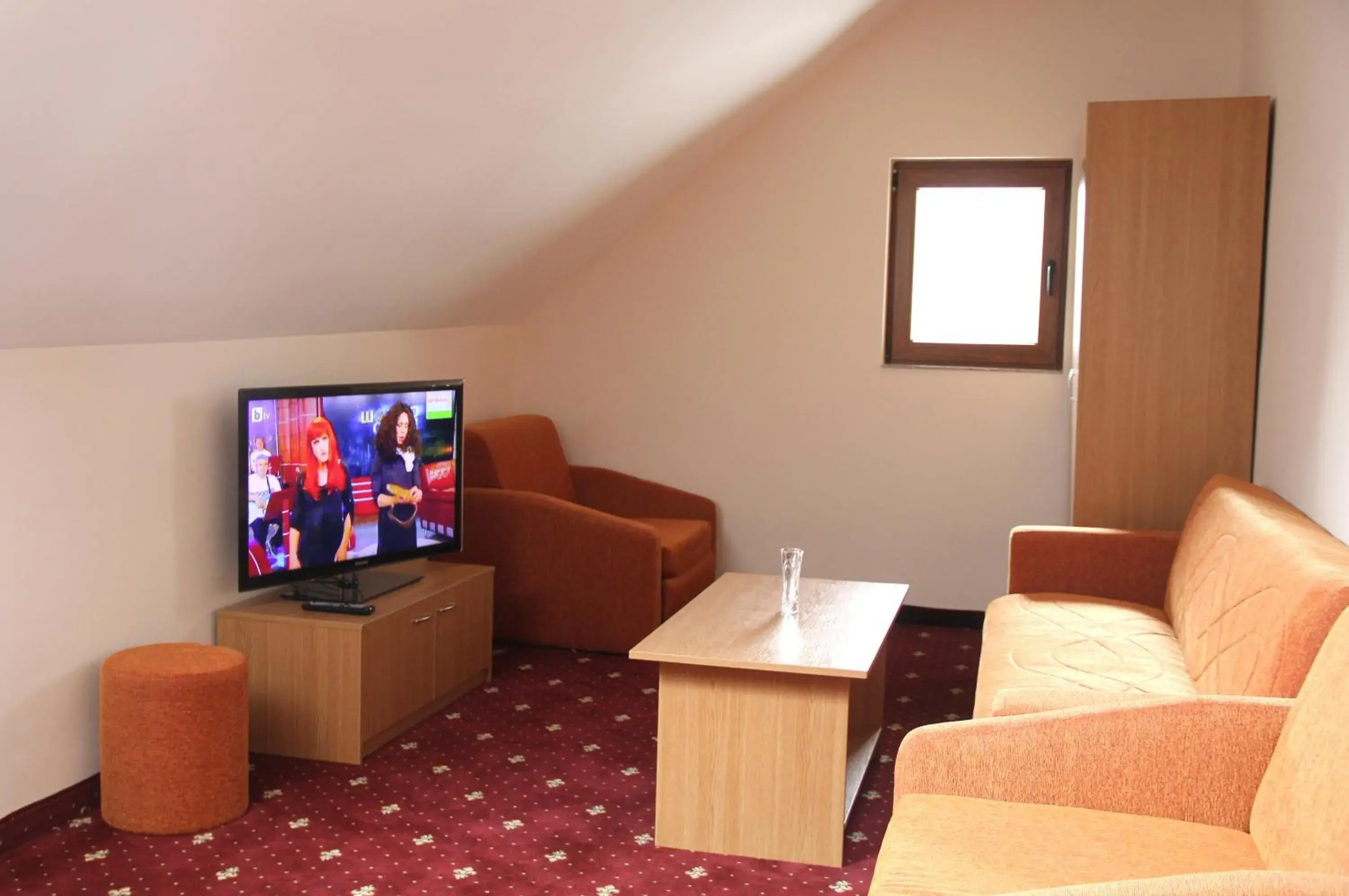 Junior Suite (2 Adults + 1 Child) in Hotel Coop Rozhen Junior Suite (2 Adults + 1 Child) in Hotel Coop Rozhen