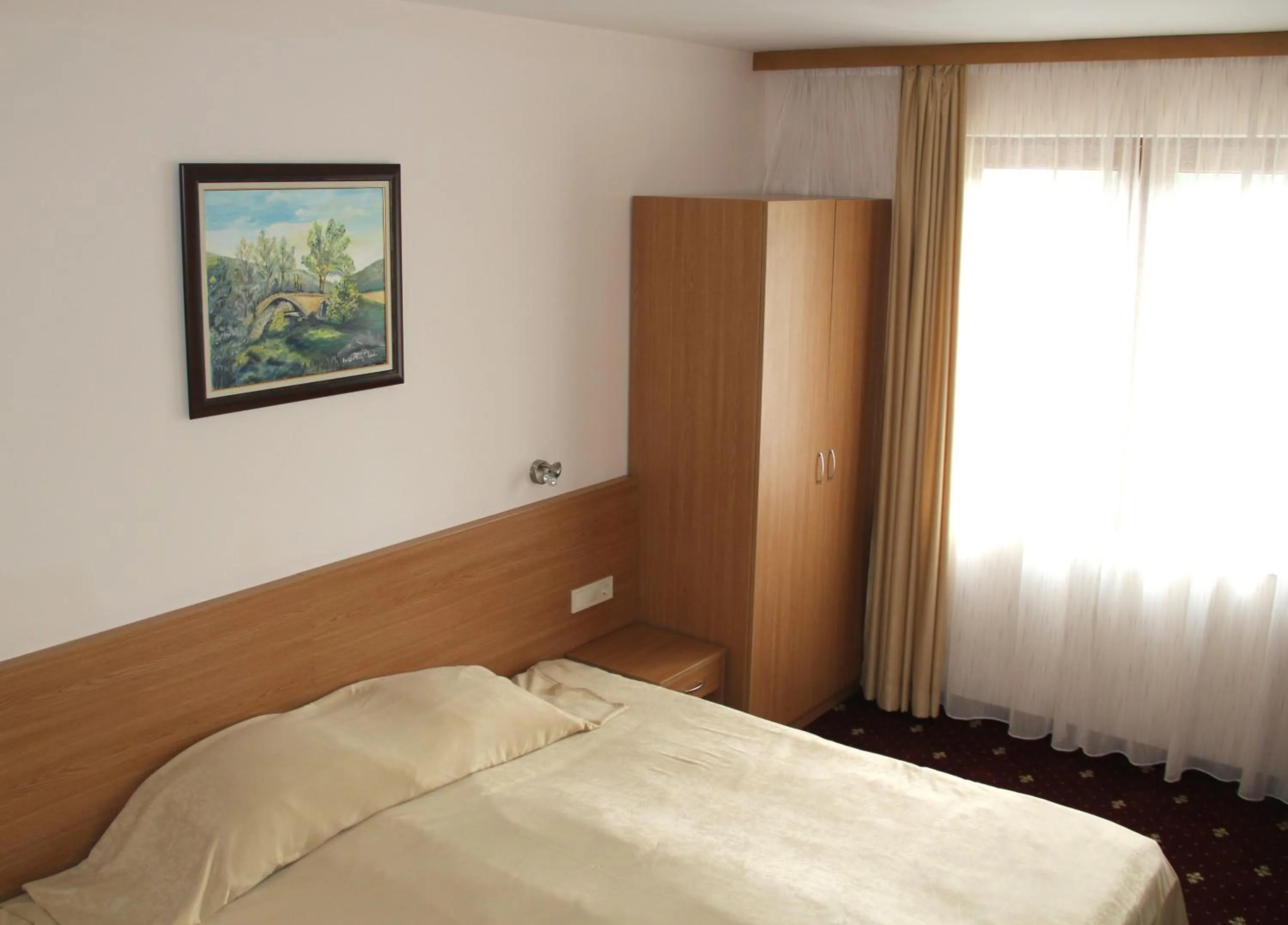 Bed in Hotel Coop Rozhen