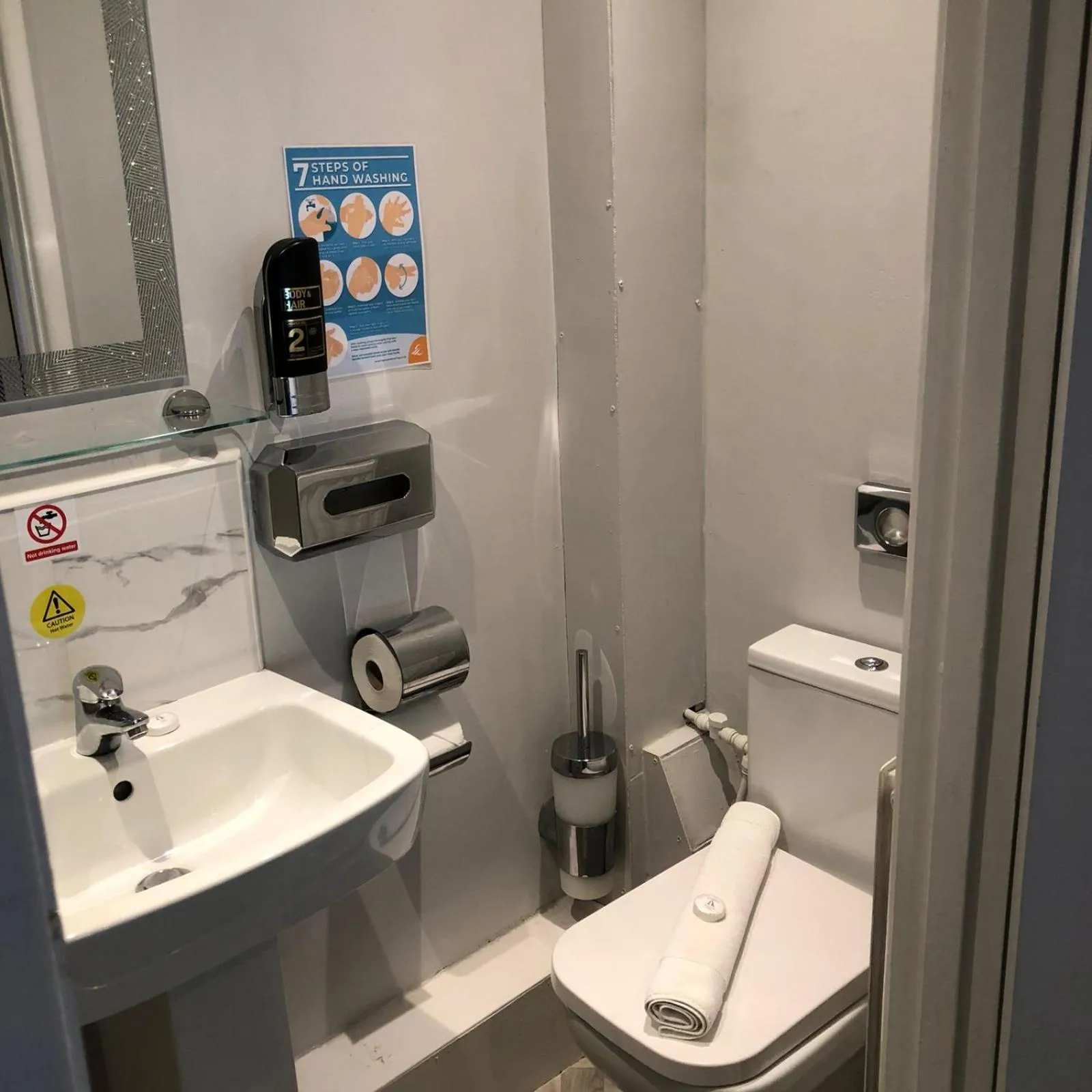 Bathroom in OYO Watton Vibe Hotel