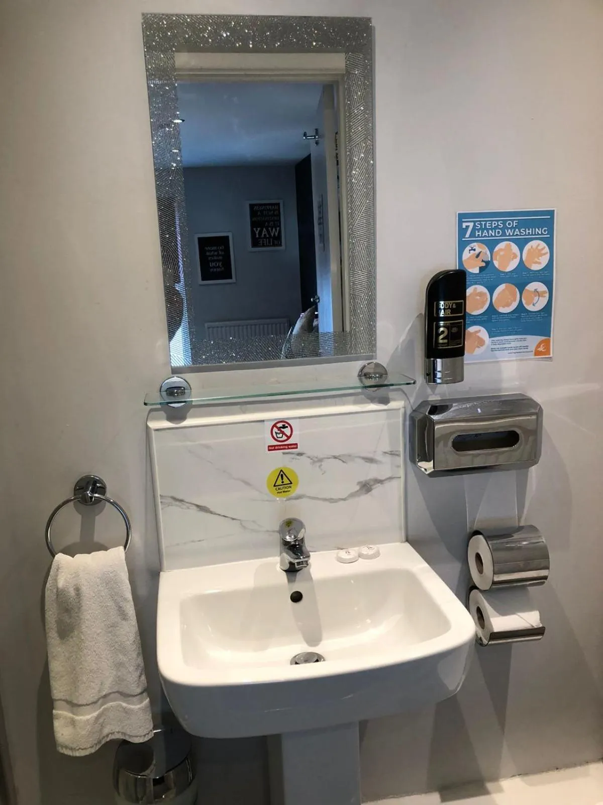 Bathroom in OYO Watton Vibe Hotel