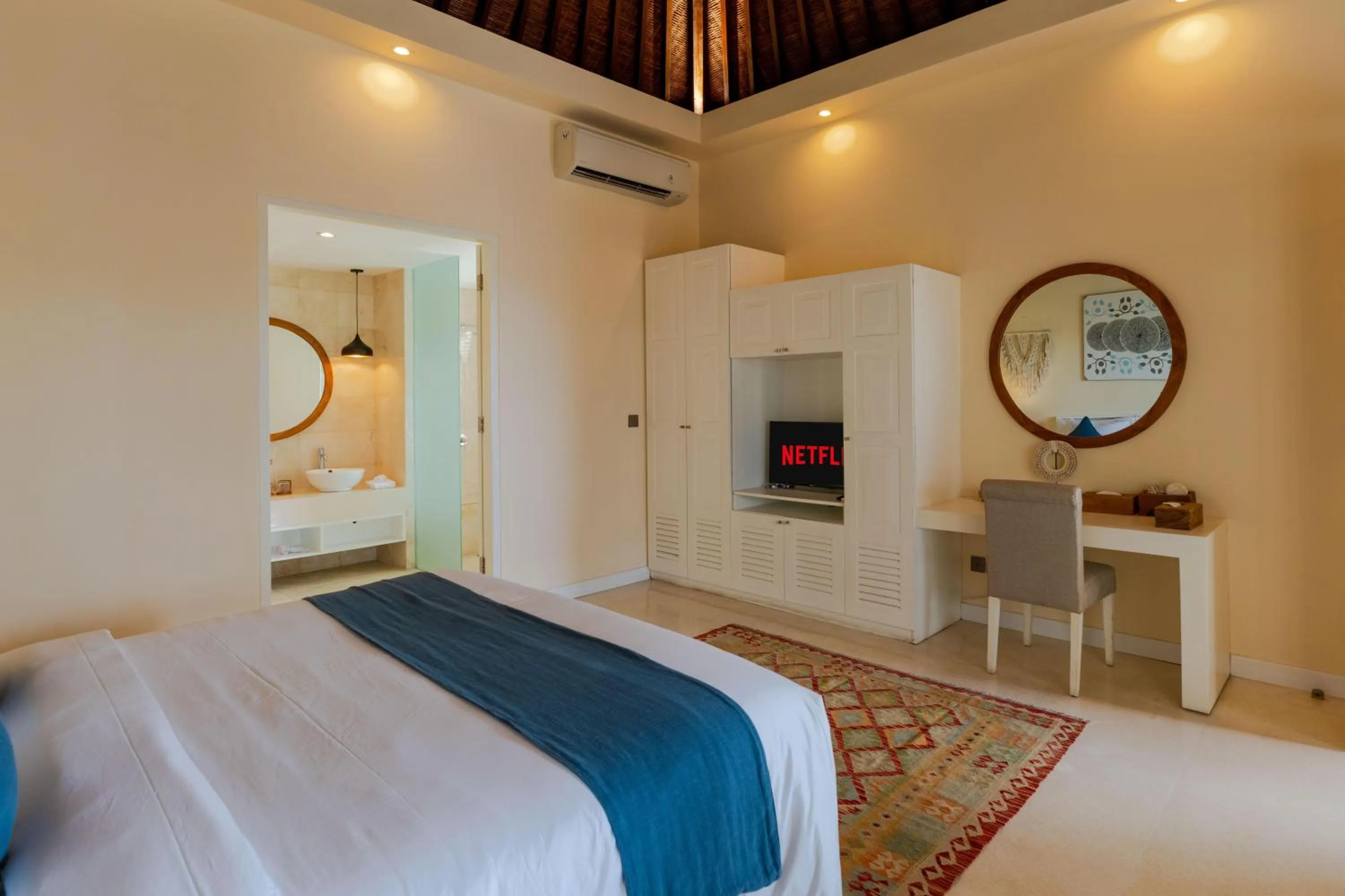 Bed in Boholuma Villas by Pertama Management