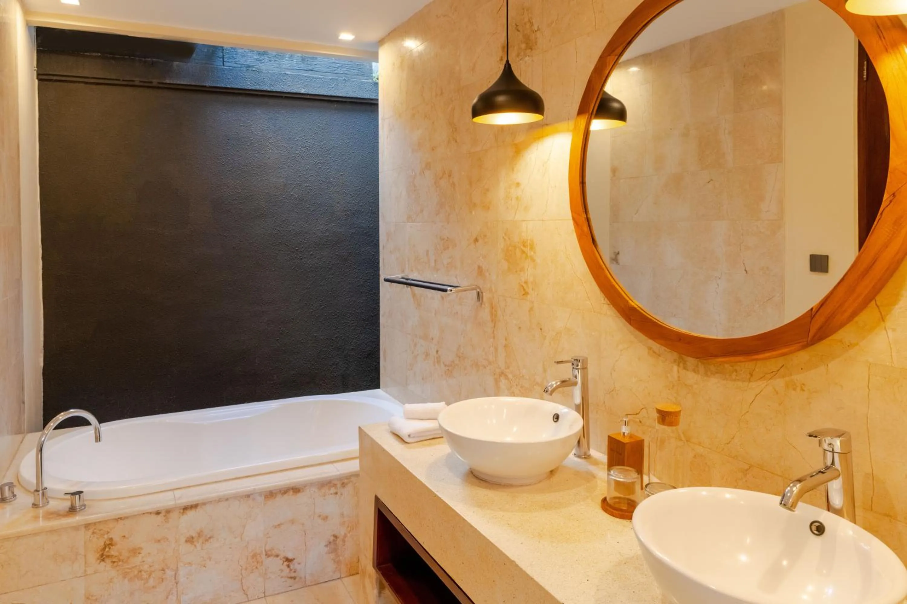 Bathroom in Boholuma Villas by Pertama Management