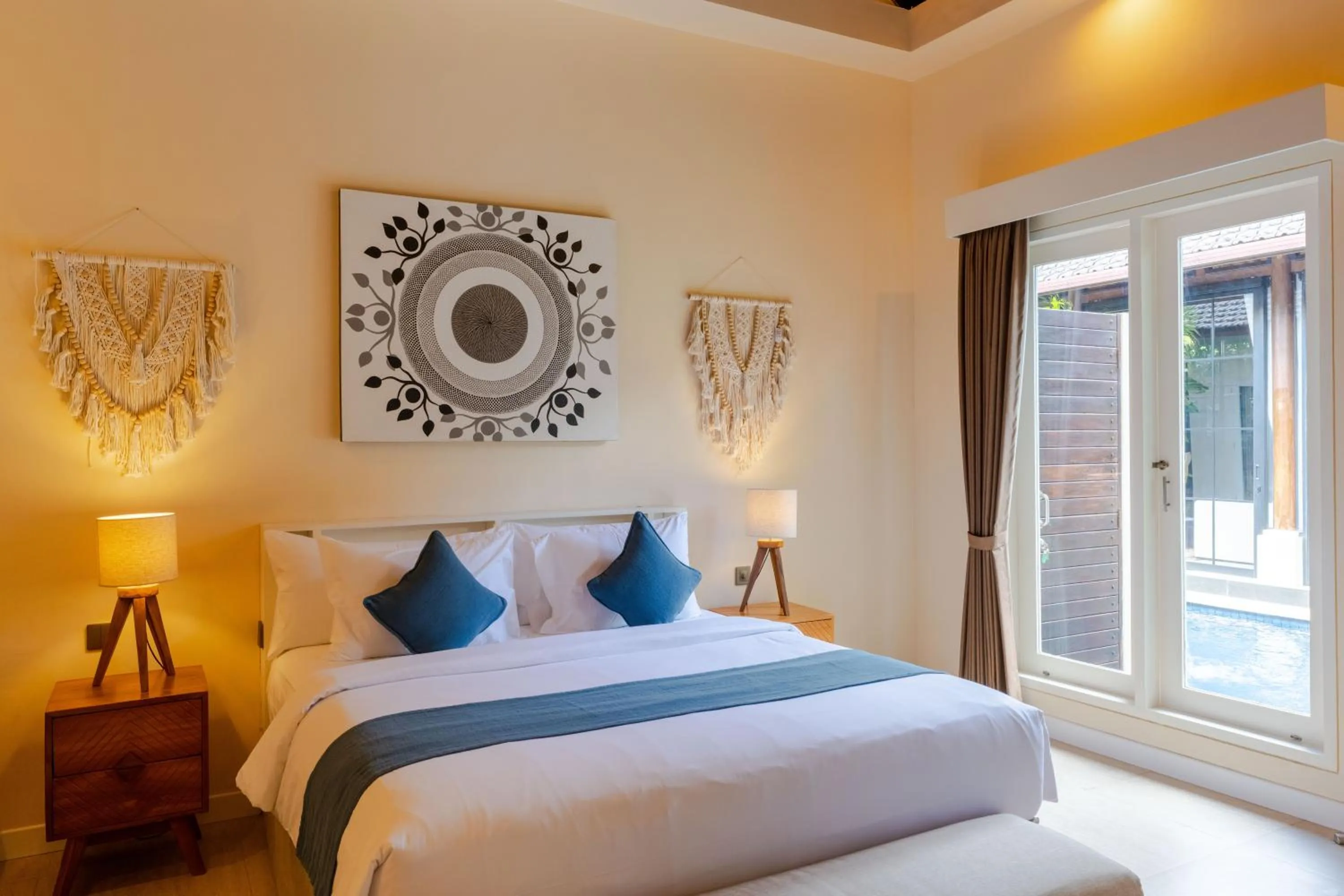 Bed in Boholuma Villas by Pertama Management