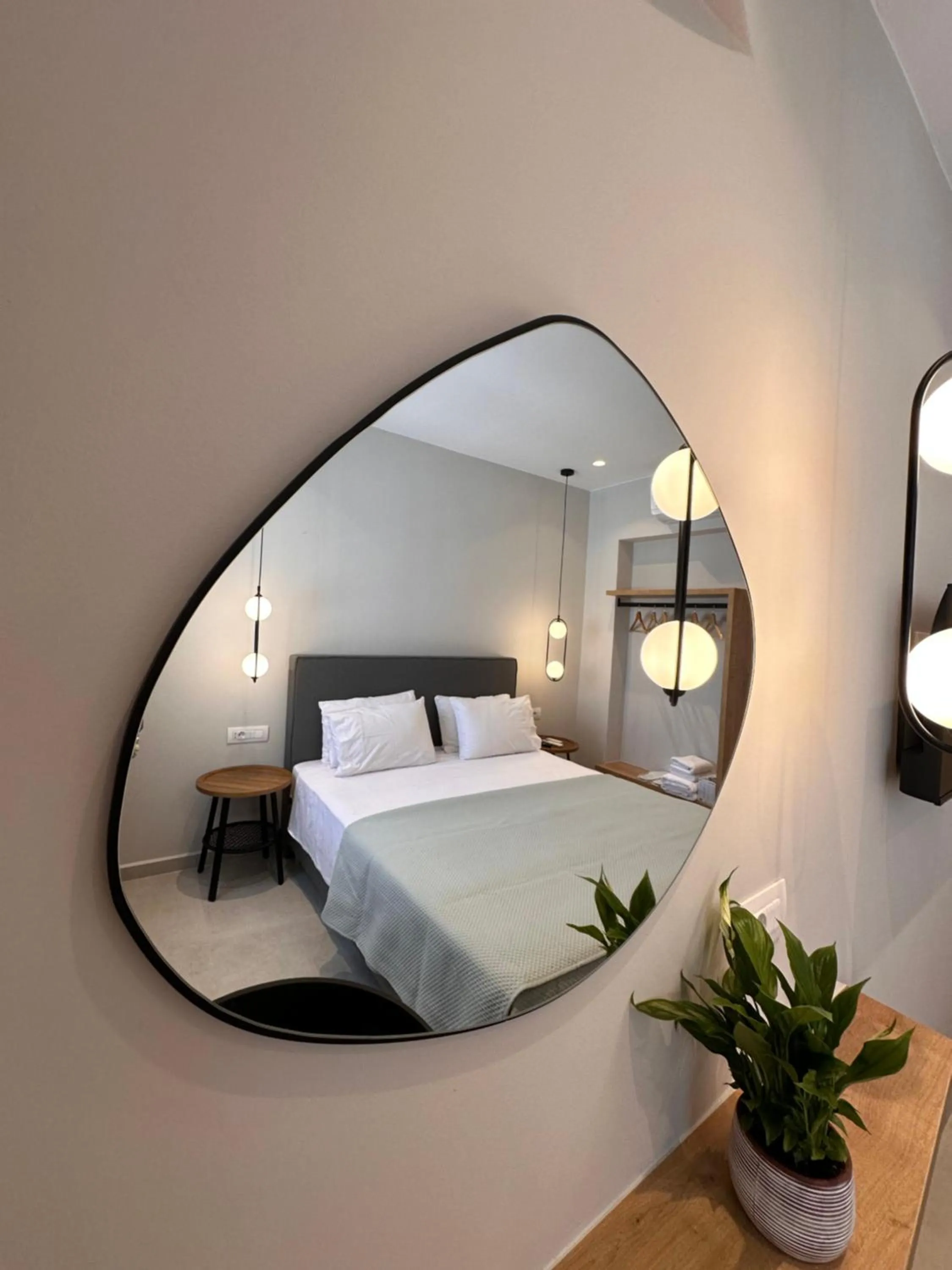 Bed in Ikaros Art Hotel