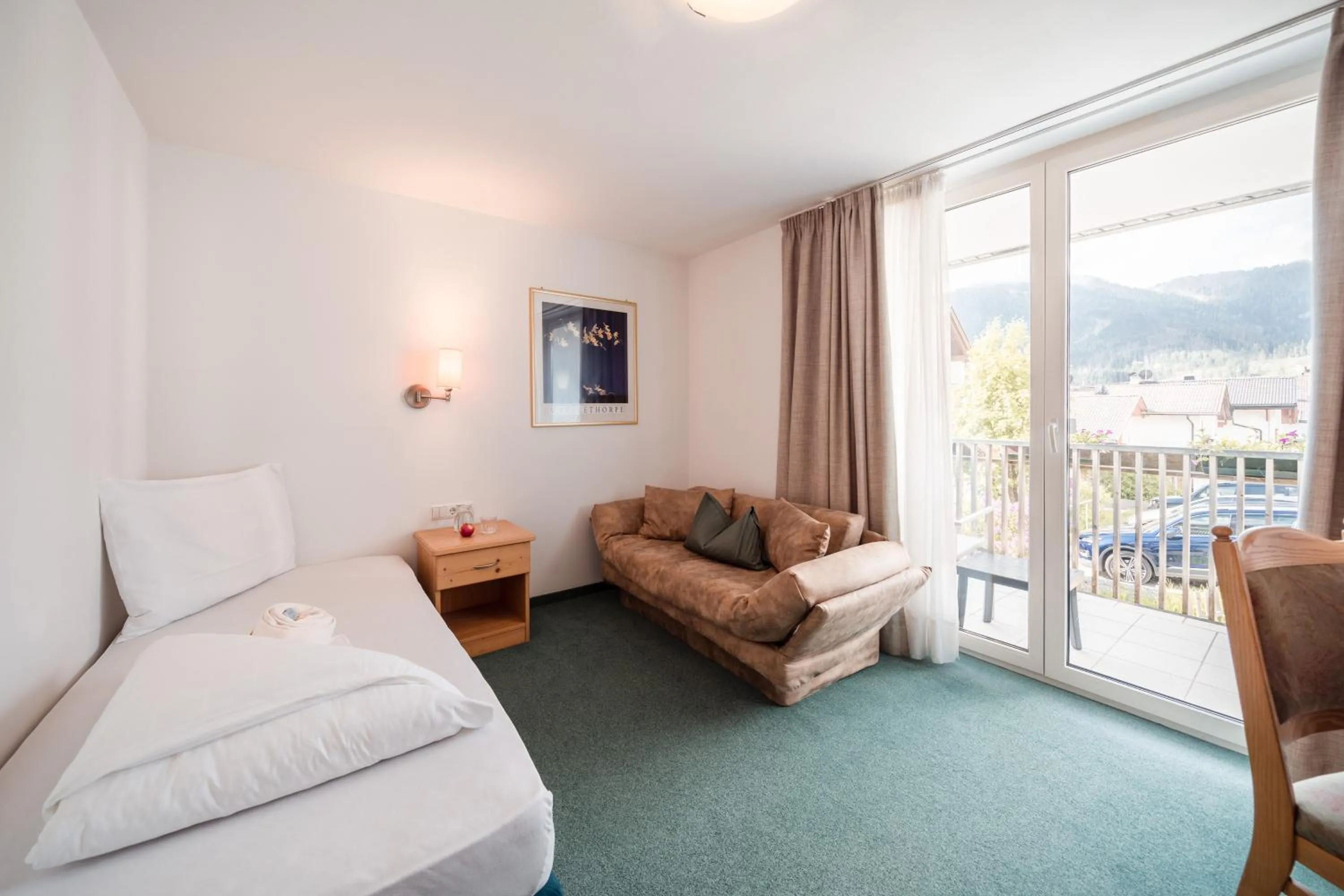 Balcony/Terrace, Bed in Hotel Pütia