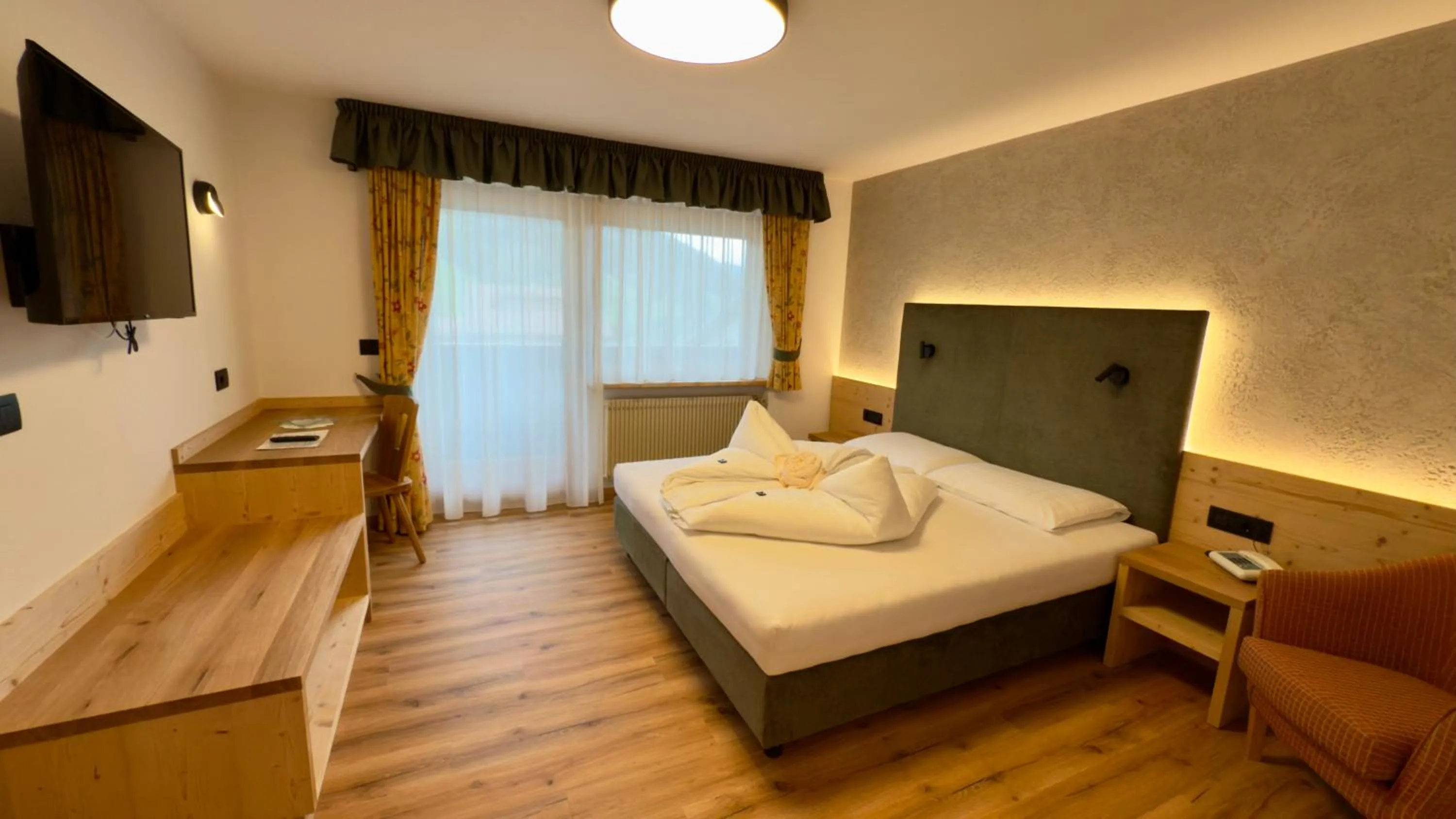 Photo of the whole room, Bed in Hotel Pütia