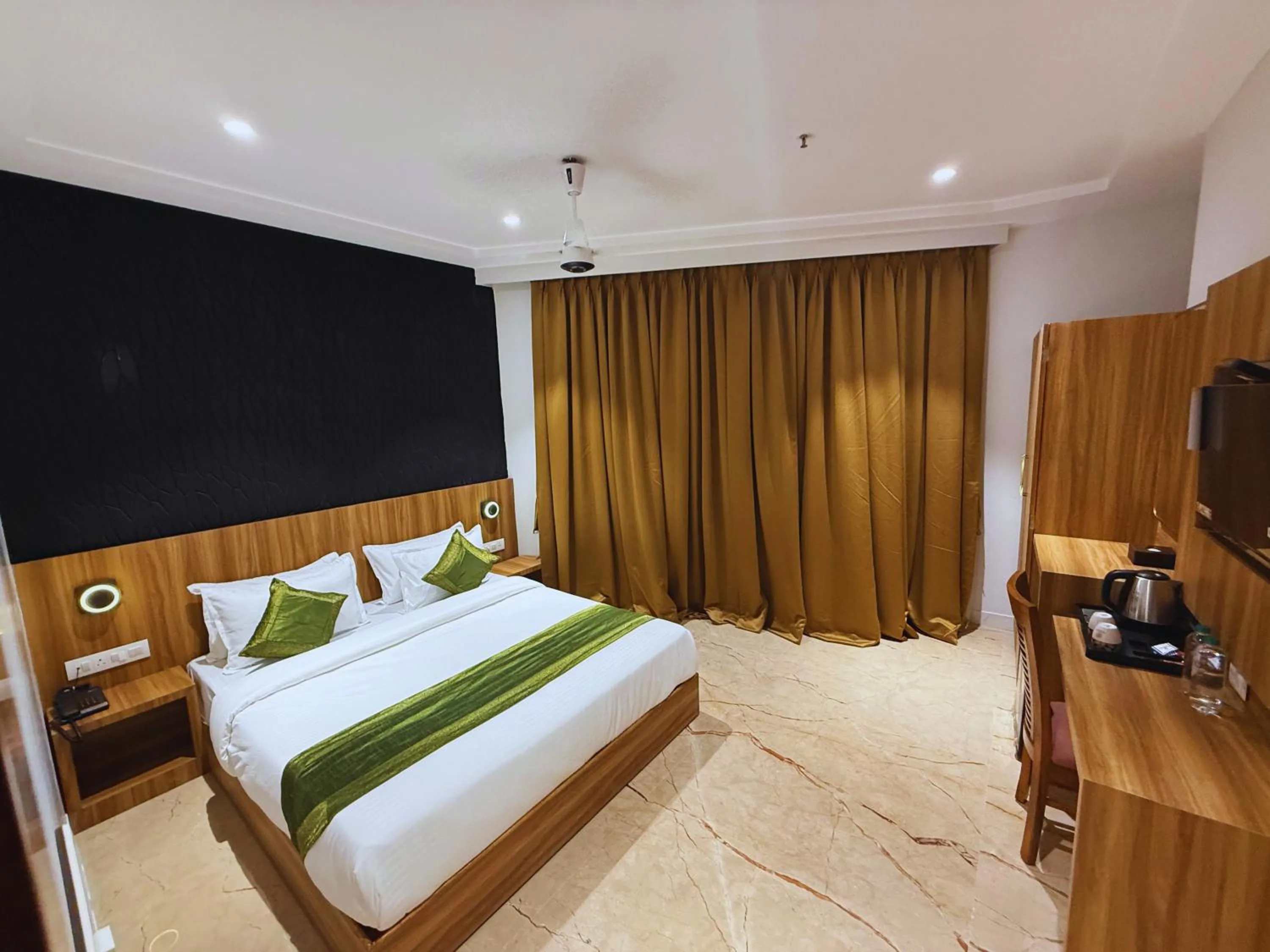 Bed in Hotel Alfa Suites