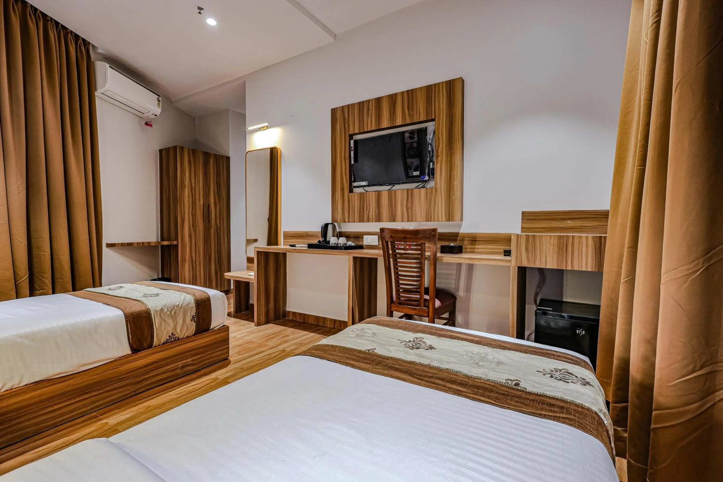 Bed in Hotel Alfa Suites