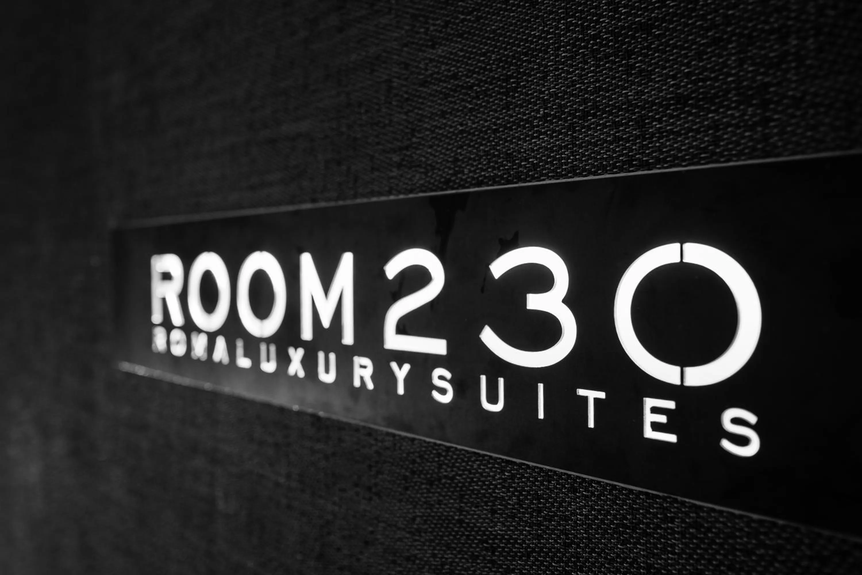 Property logo or sign in Room 230 Roma Luxury Suites