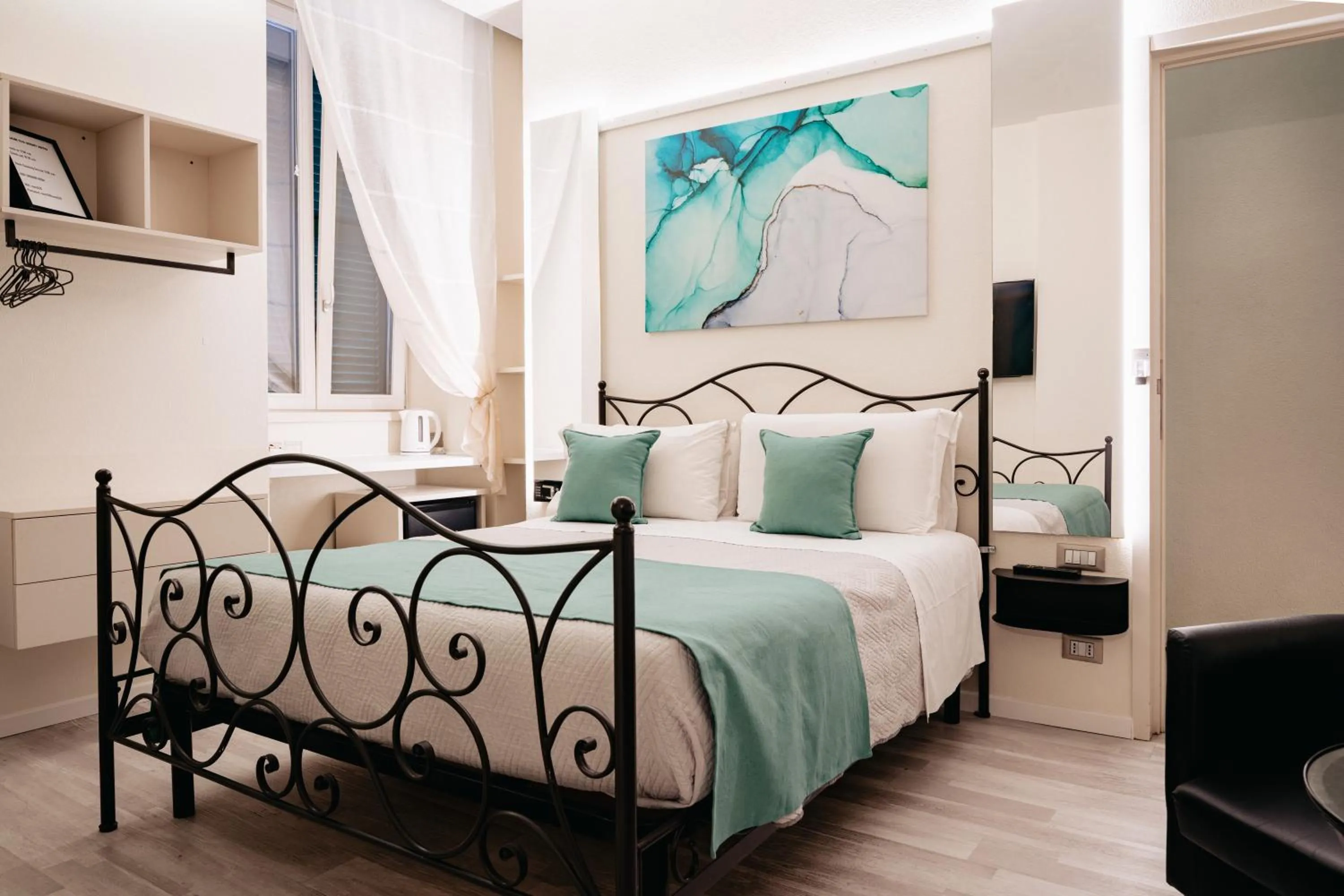 Bed in Room 230 Roma Luxury Suites