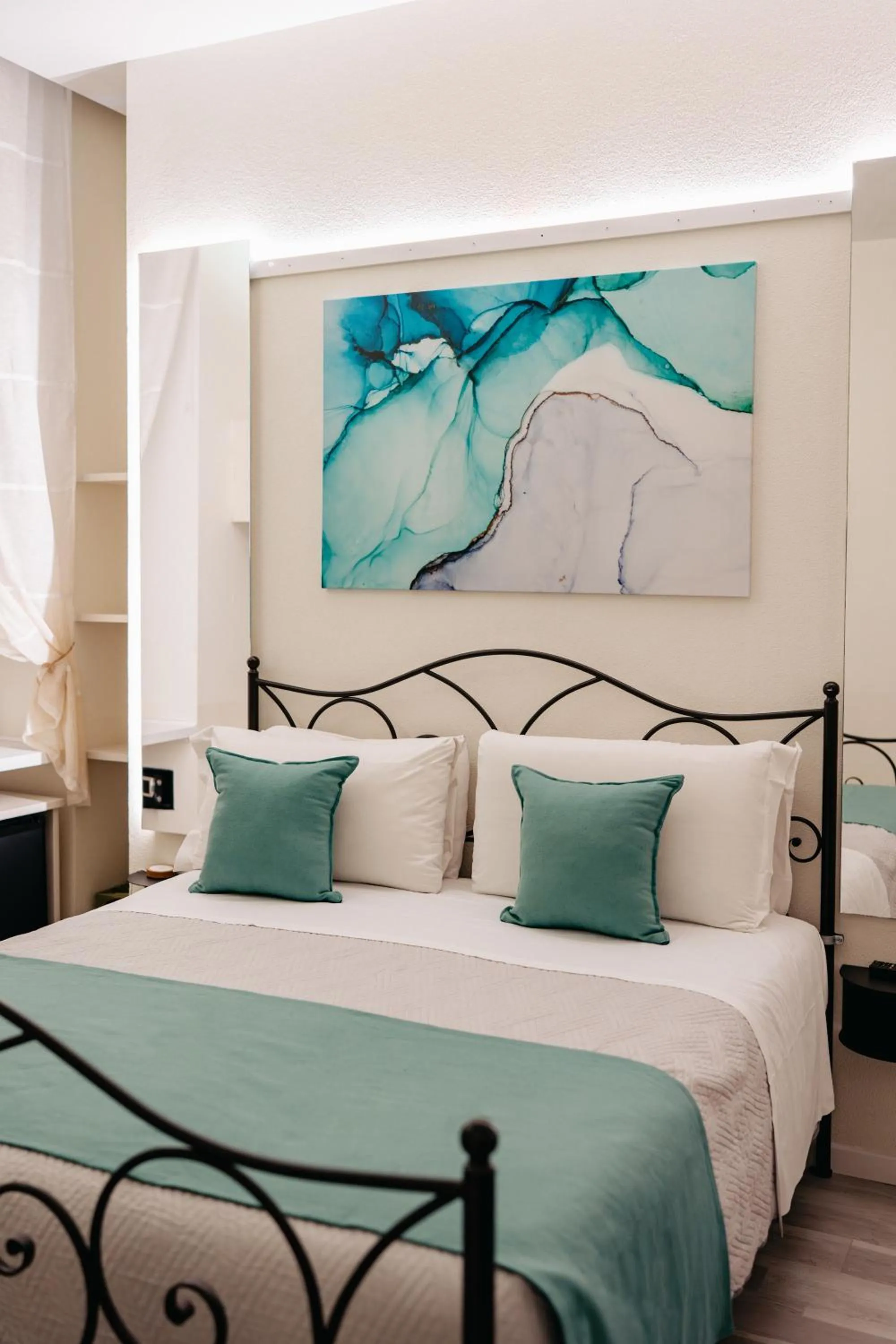 Bed in Room 230 Roma Luxury Suites