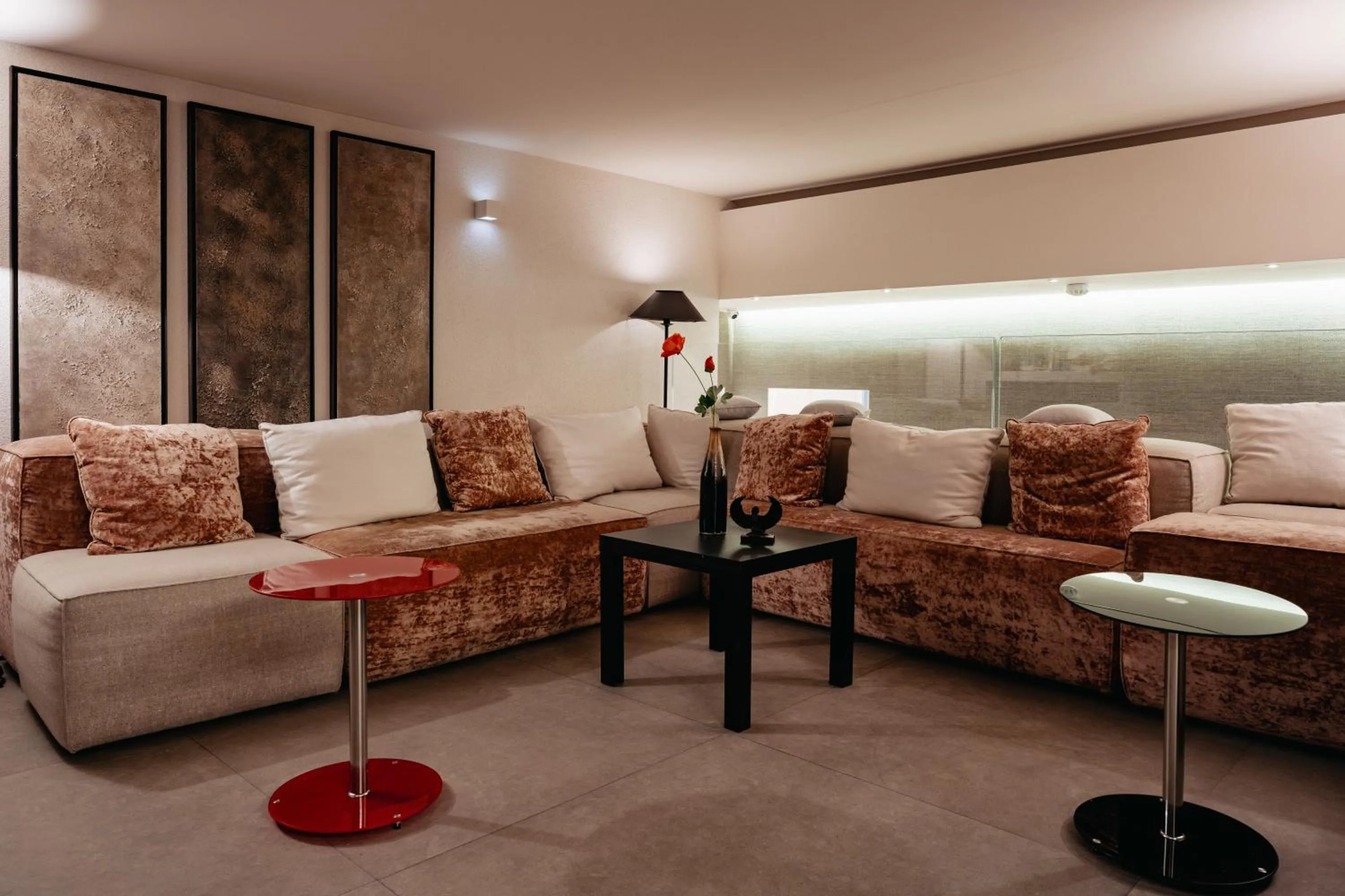 Seating area in Room 230 Roma Luxury Suites