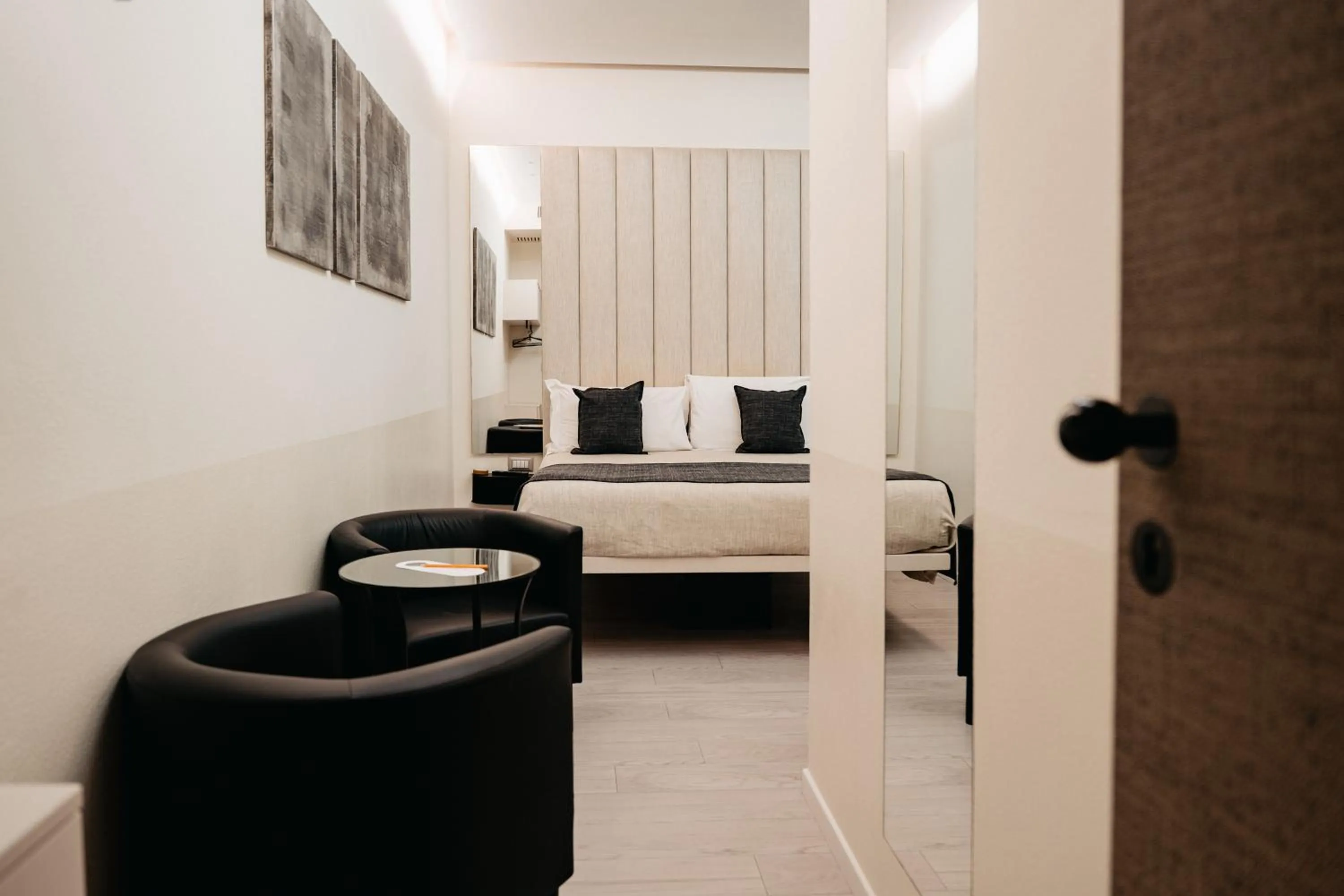 Bed in Room 230 Roma Luxury Suites