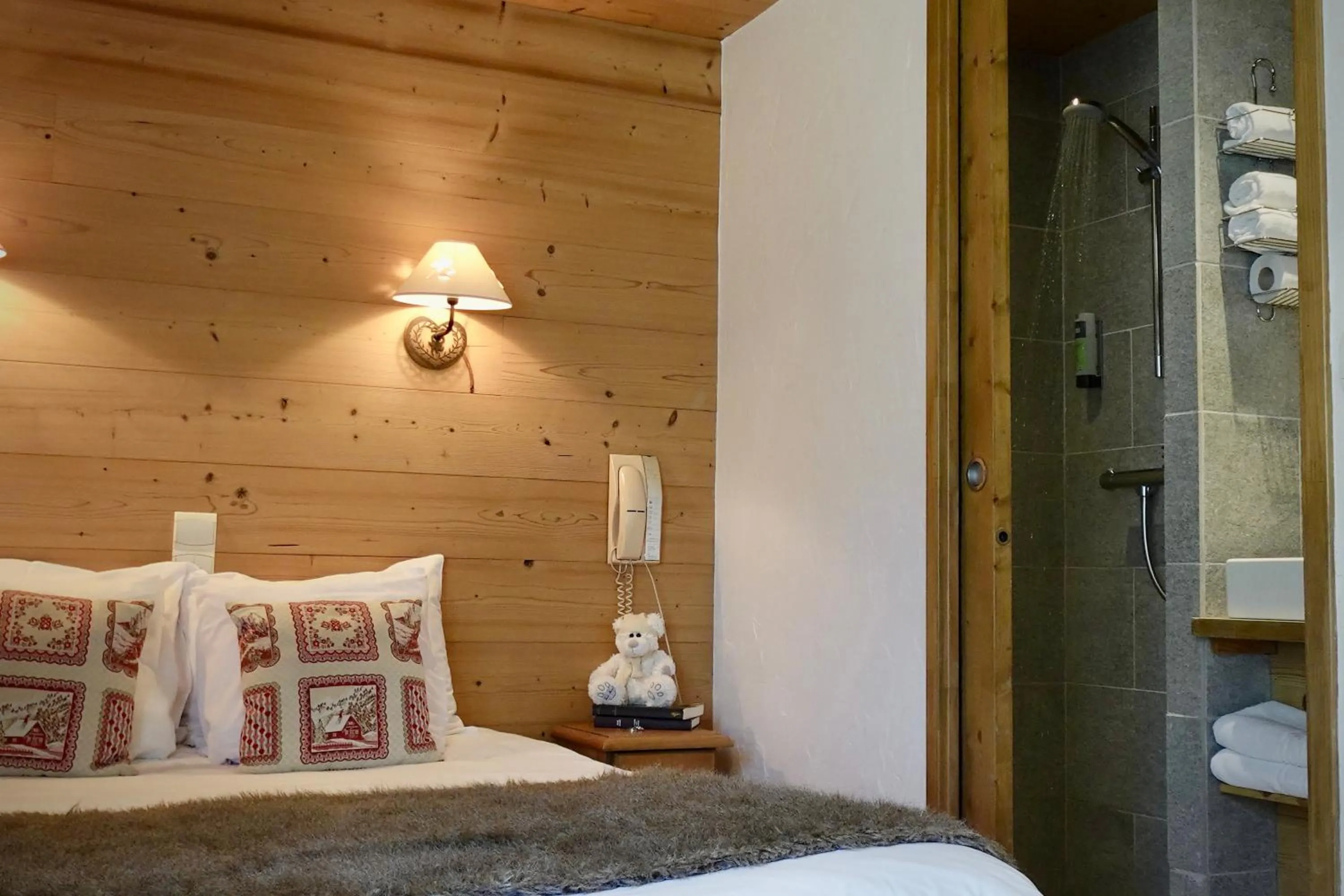 Bed in Hotel La Crémaillère