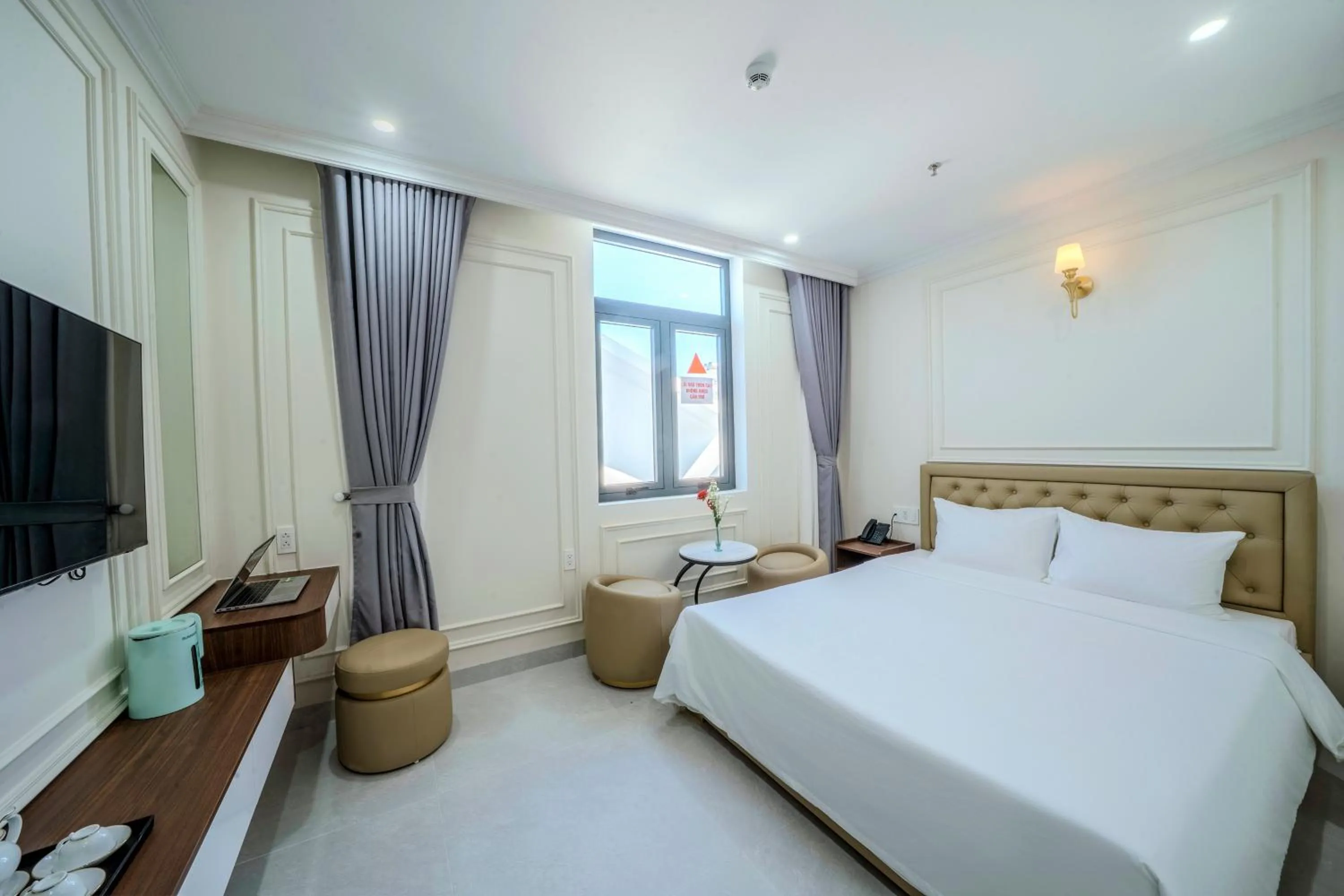 Bed in Tourane Boutique Hotel