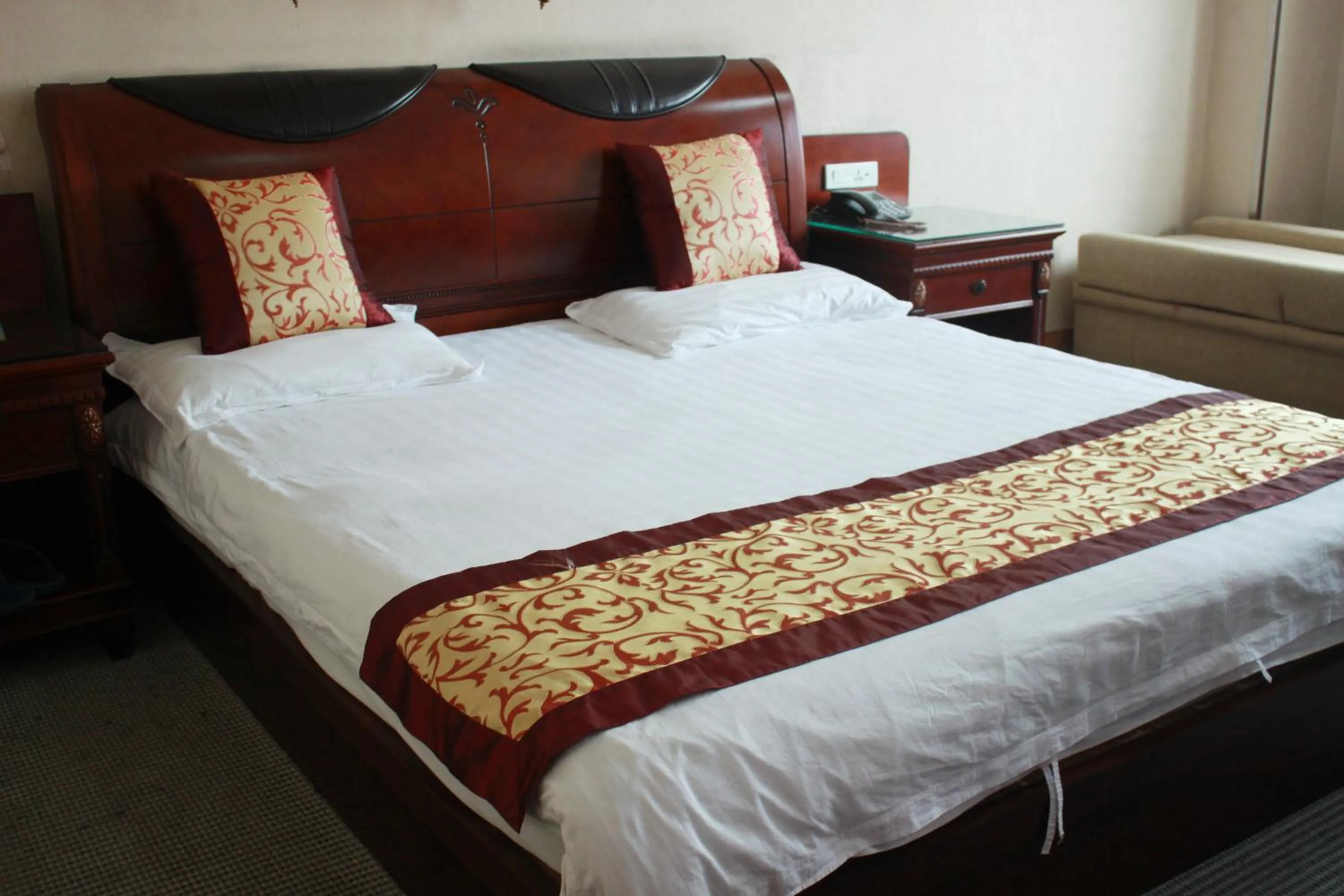 Bed in Taizhou Taishan Business Hotel