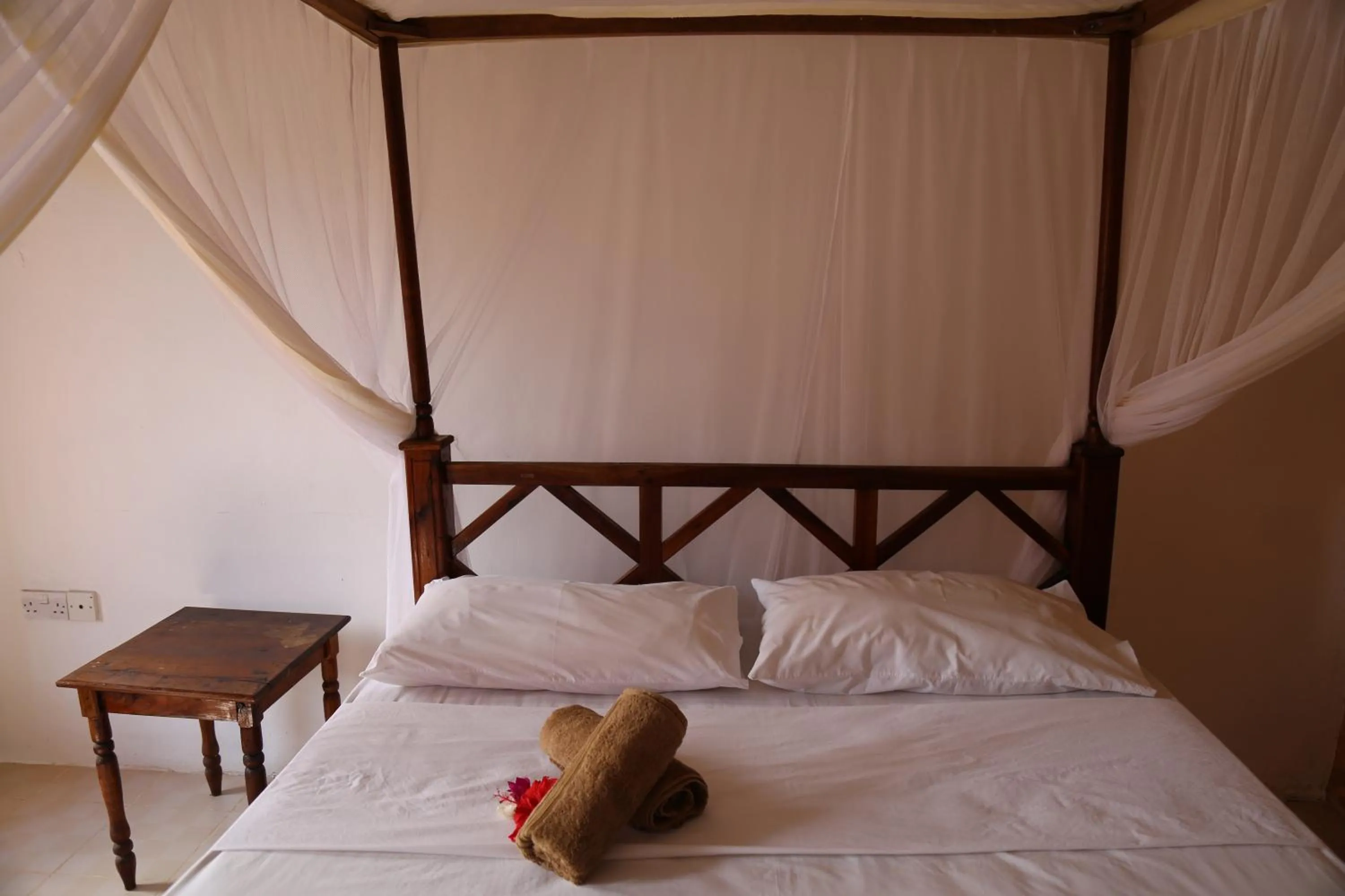 Bed in Kigwedeni Villas