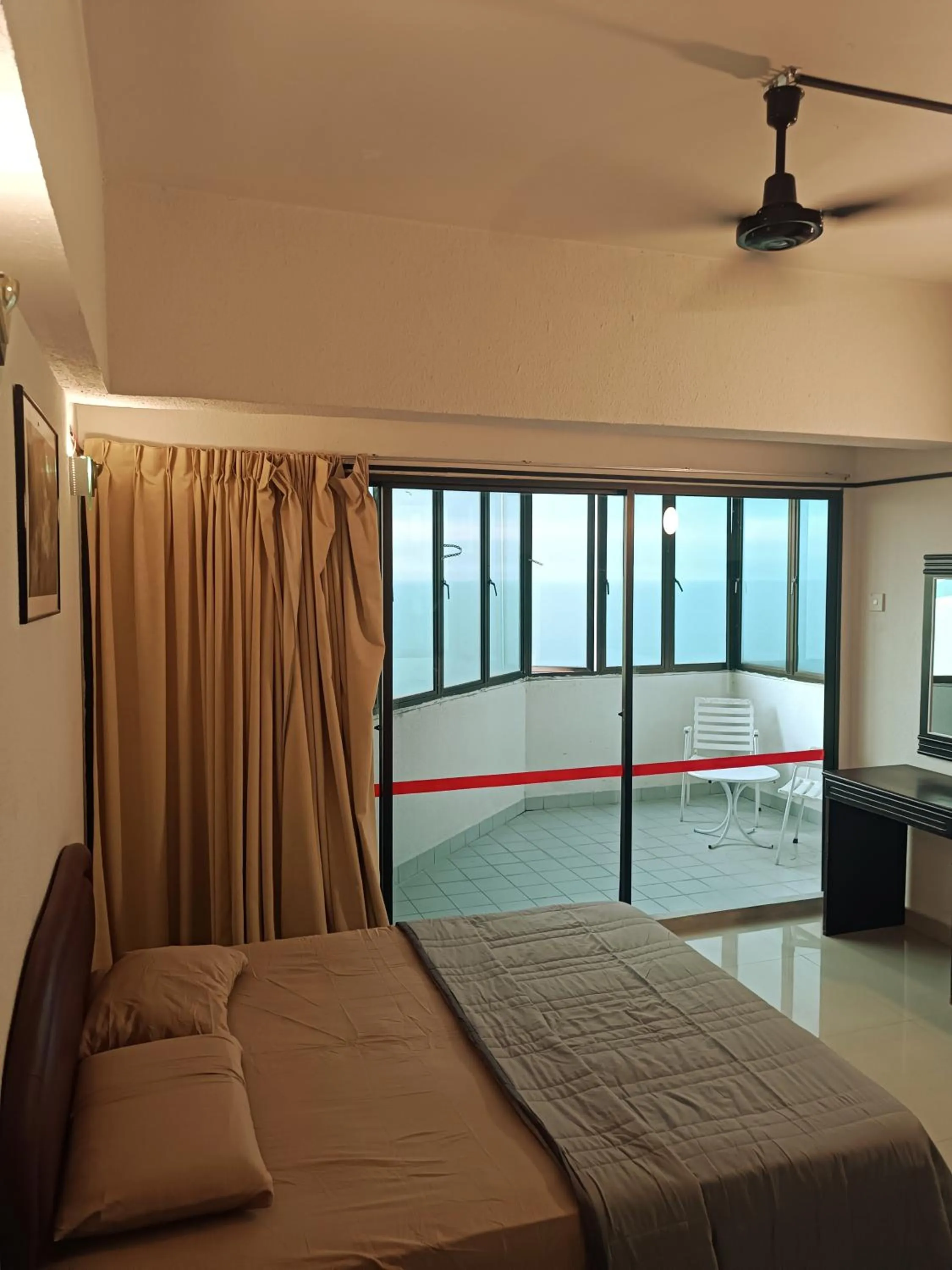 Bed in Sri Sayang Resort Apartment