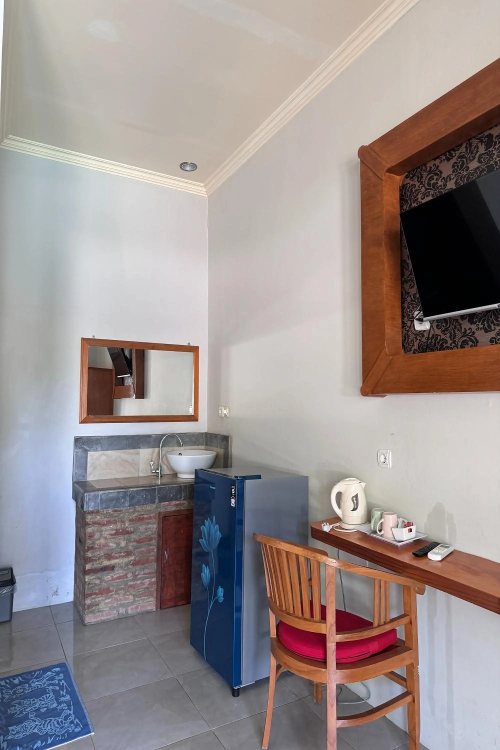 Kitchen or kitchenette in Senggigi Cottages Lombok