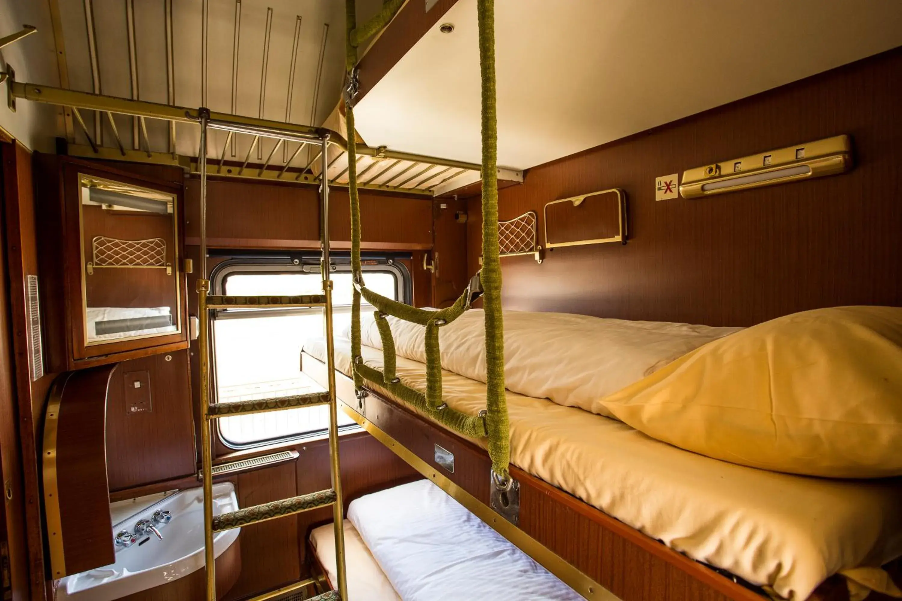 Triple Compartment with Shared Bathroom in Train Lodge Amsterdam Triple Compartment with Shared Bathroom in Train Lodge Amsterdam