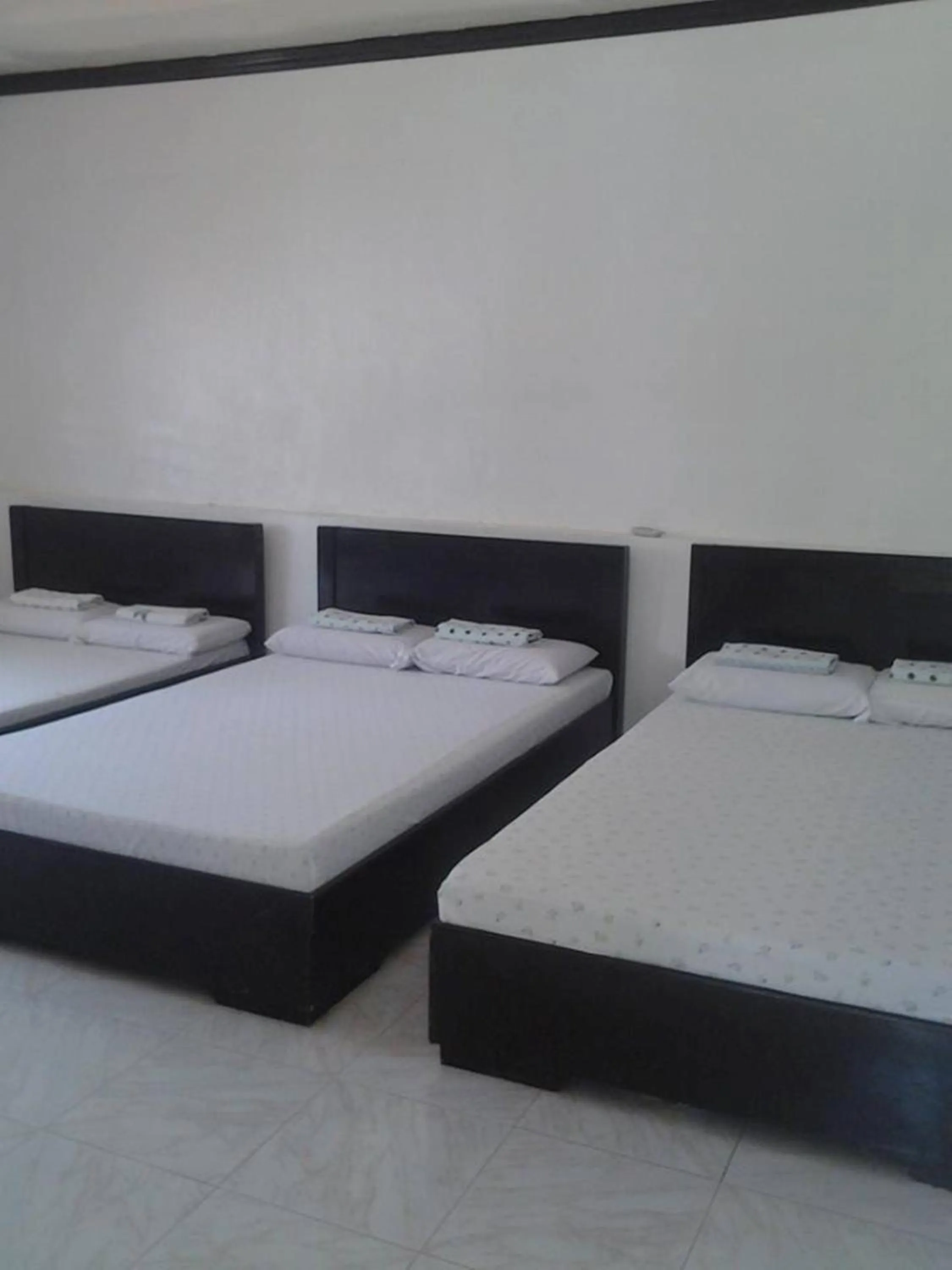 Bed in Pabua's Cottages