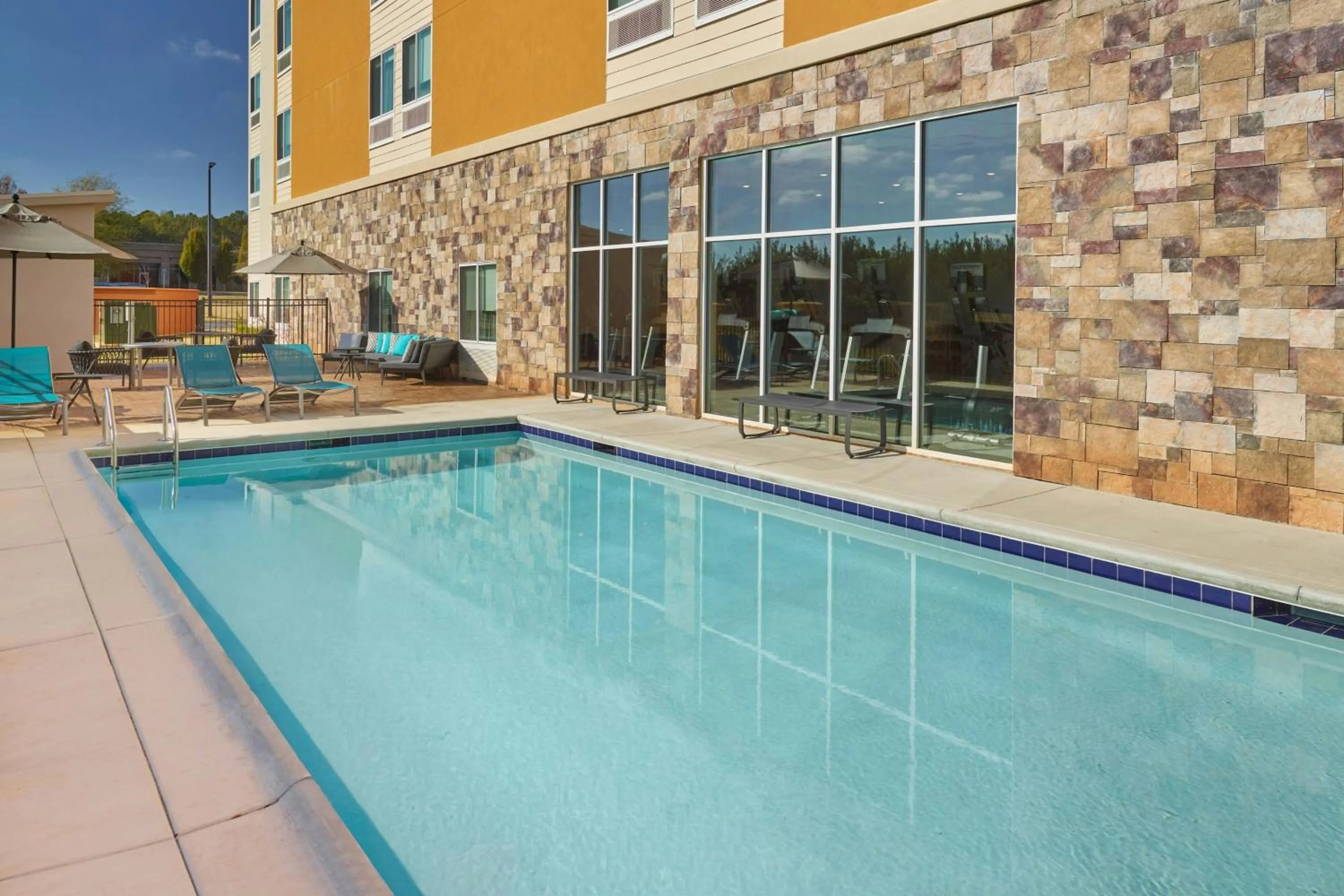Swimming pool in TownePlace Suites by Marriott Locust Grove