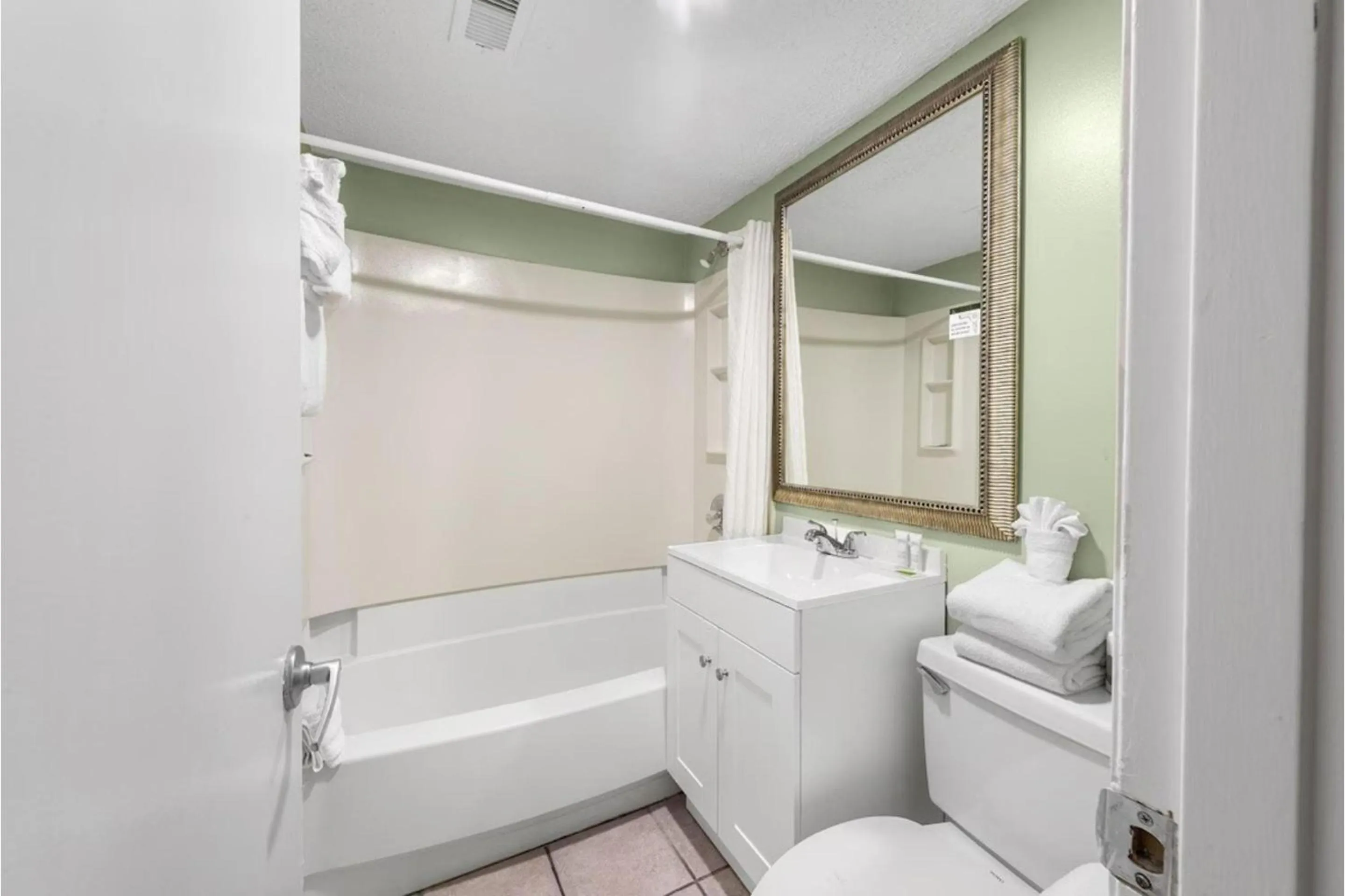 Bathroom in Capital O Sunset Waves Hotel Myrtle Beach Oceanfront